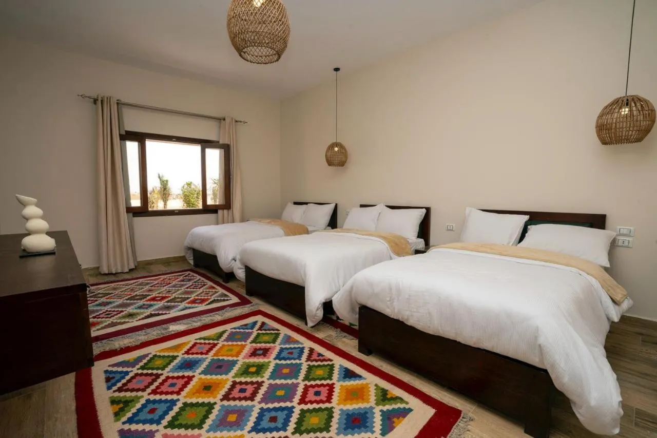 Bed in Azad Siwa Hotel
