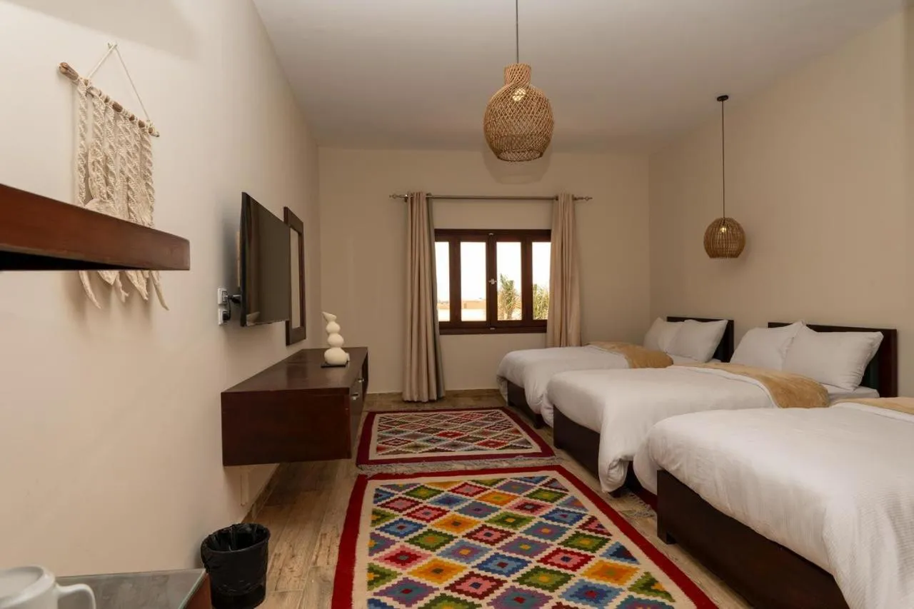 Bed in Azad Siwa Hotel