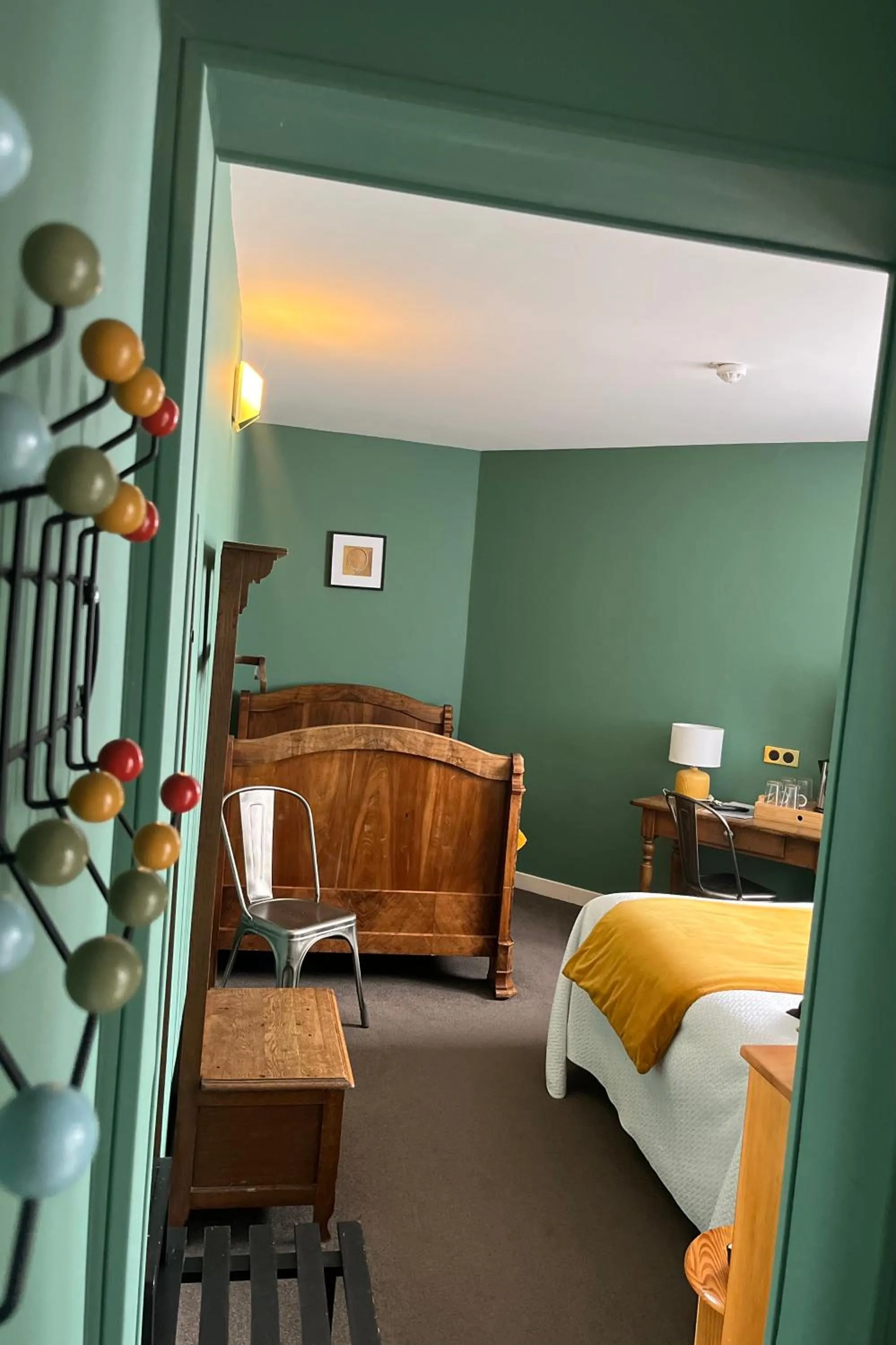 Bed in Le Téméraire Hôtel