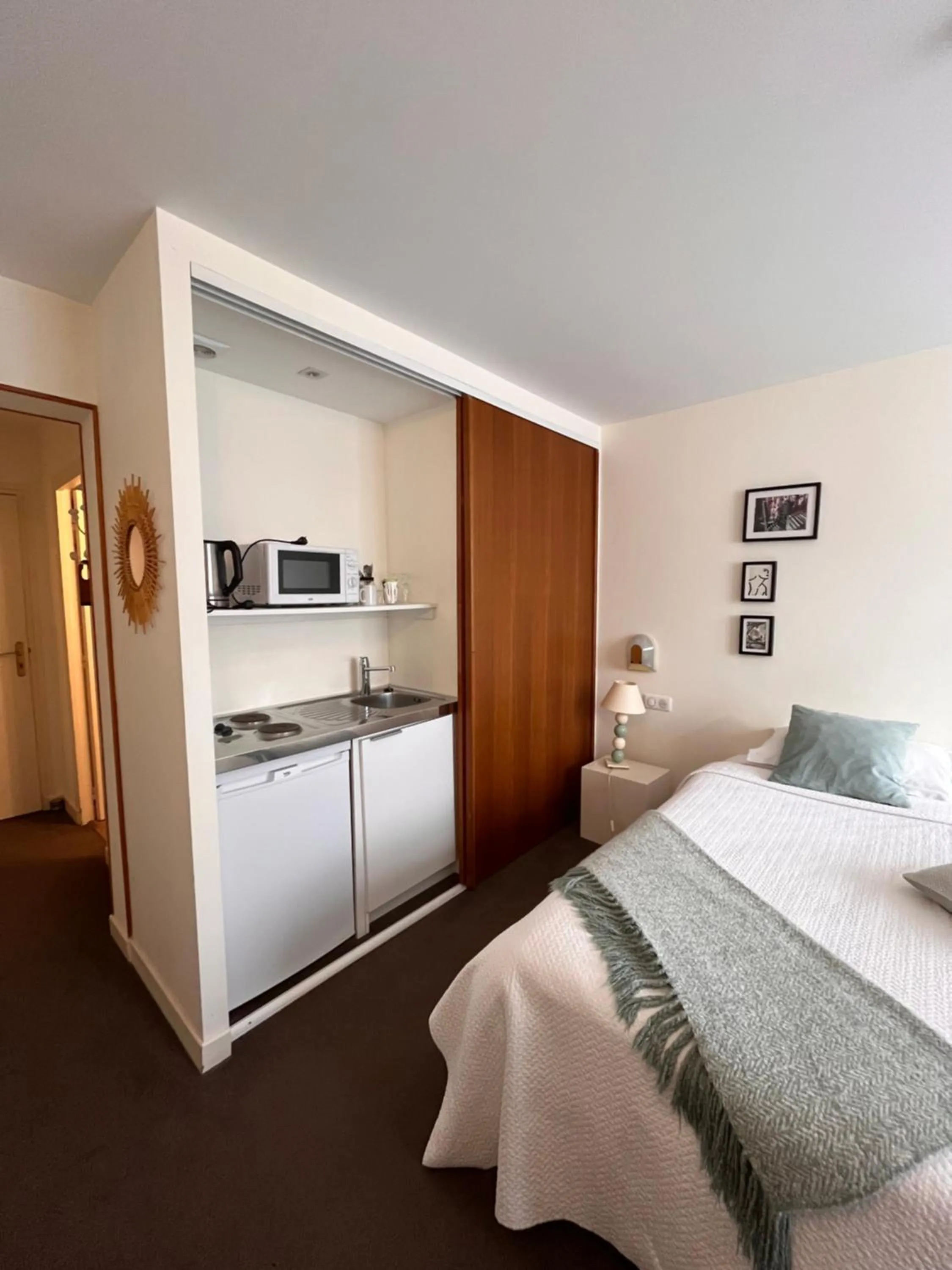 Bed in Le Téméraire Hôtel