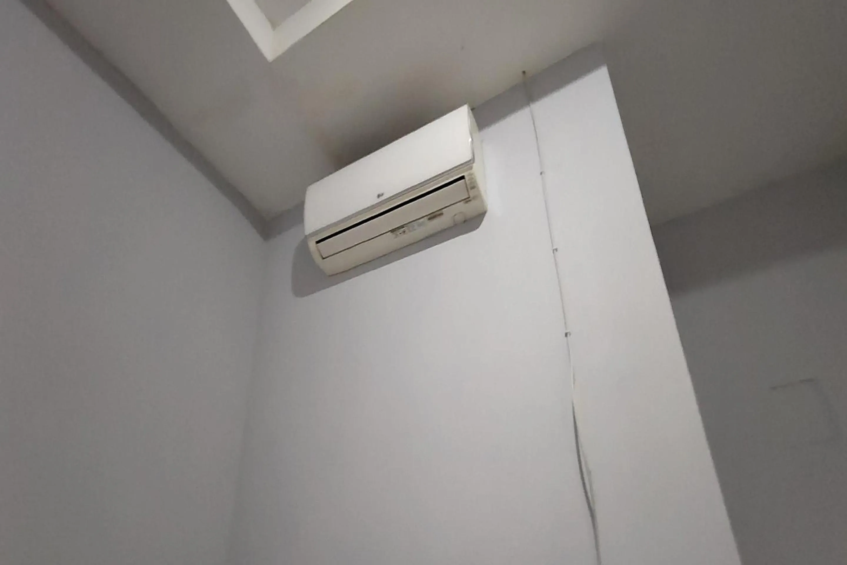 Bedroom in Hotel O Wisma Flamboyan NearTaman Makam Pahlawan