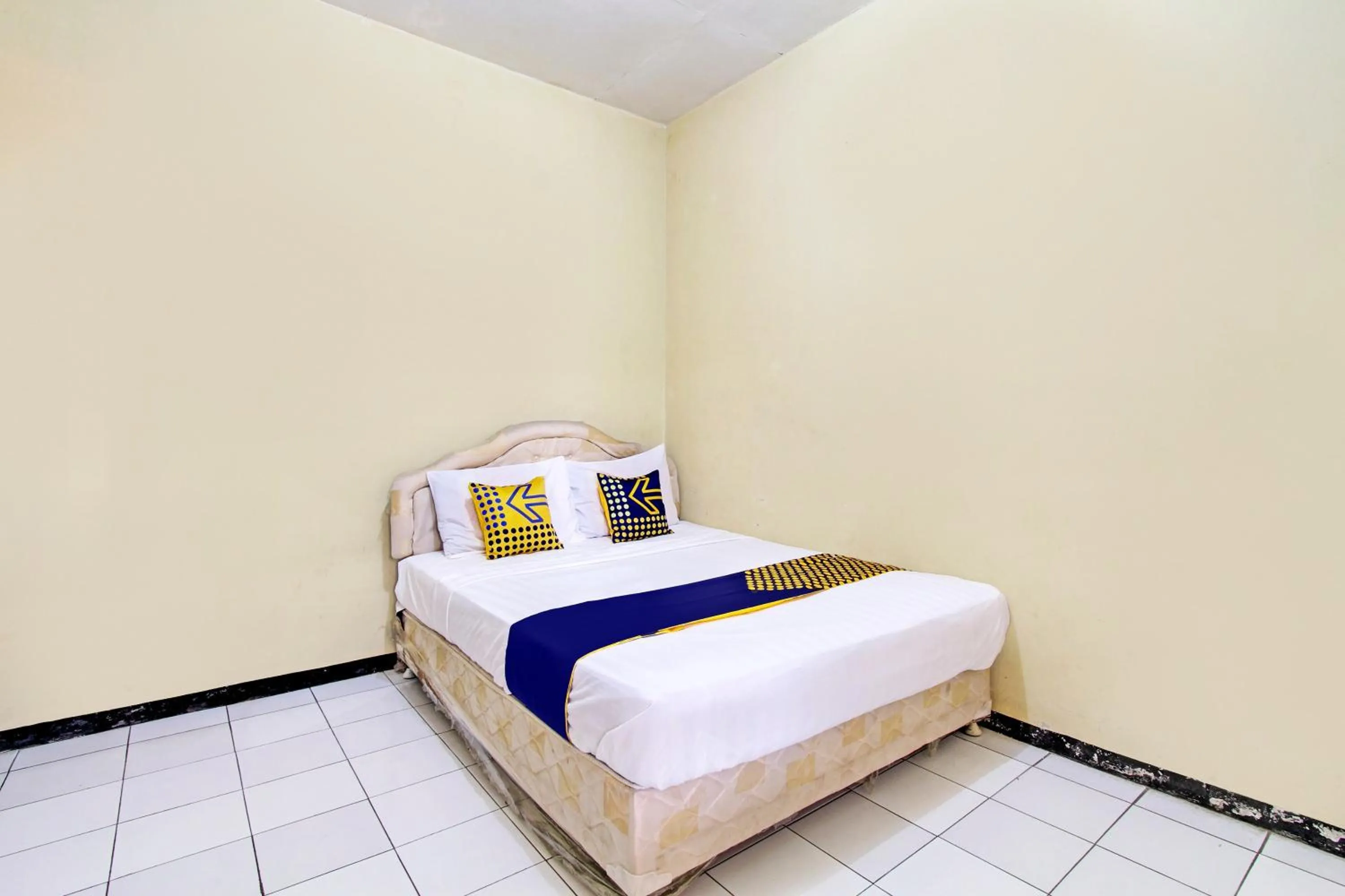Bedroom, Bed in Hotel O Juan Guest House