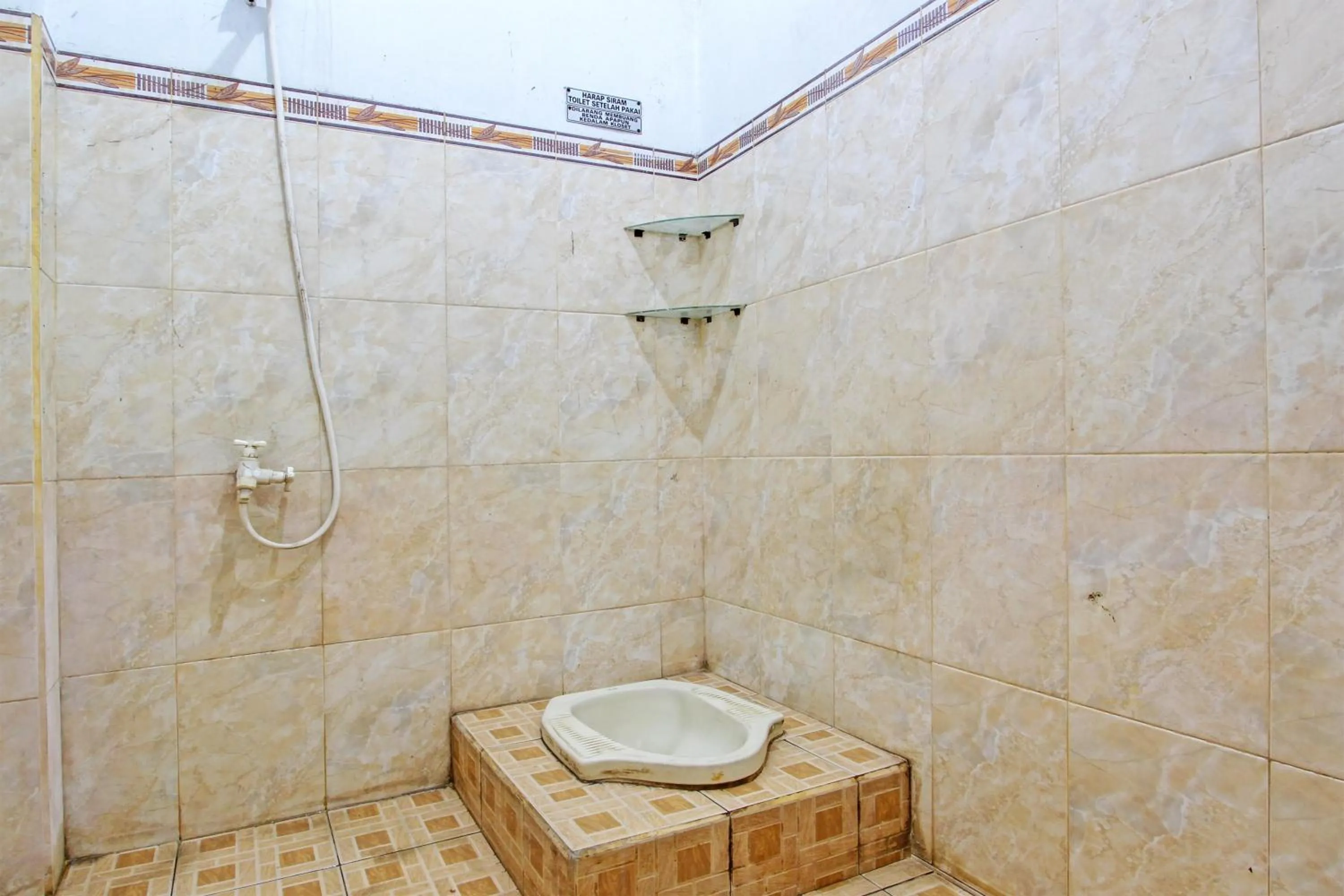 Bathroom in Hotel O Juan Guest House