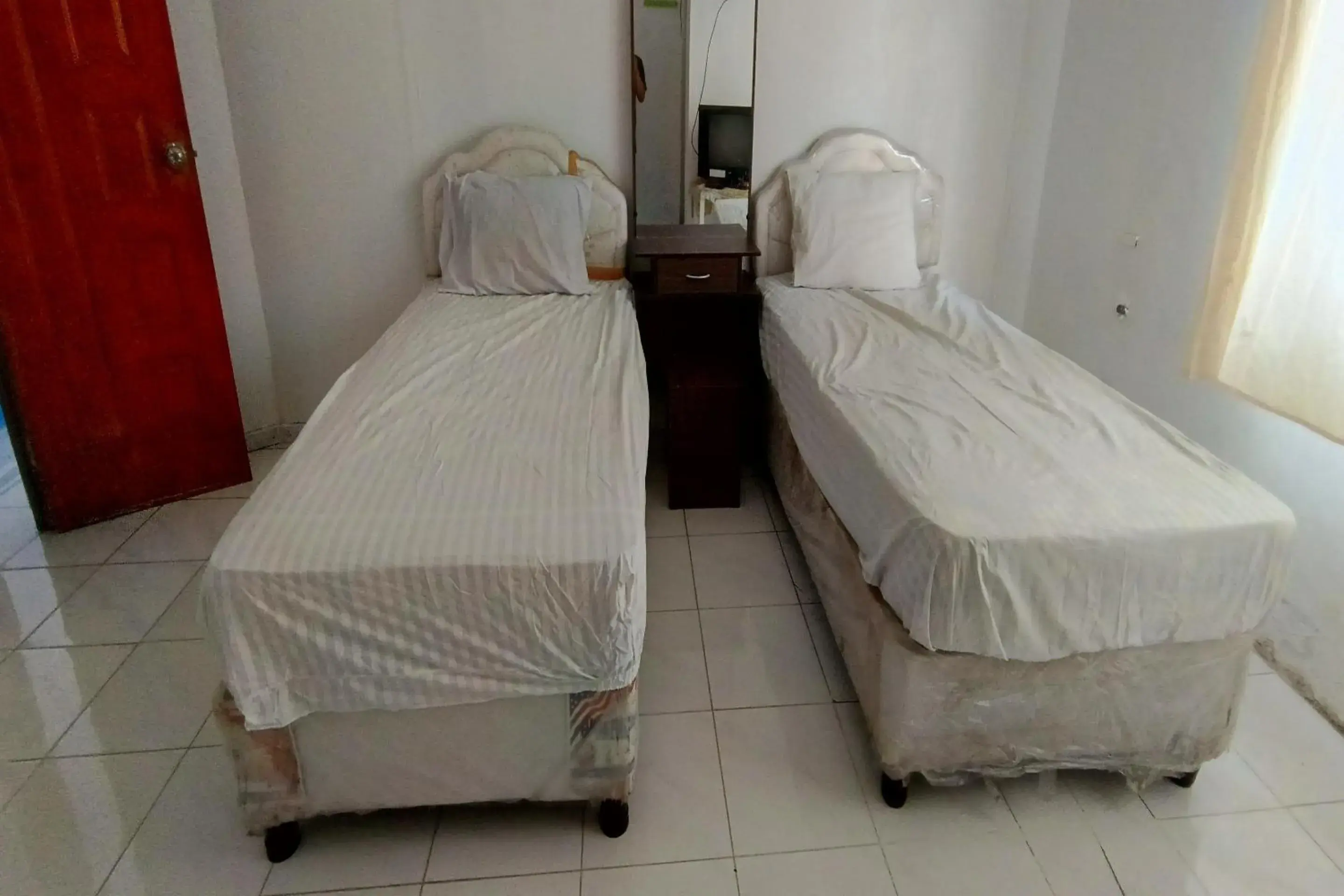 Bedroom, Bed in Hotel O Umbuy Homestay NearKetupat Kandangan Haji Irus Bedroom, Bed in Hotel O Umbuy Homestay NearKetupat Kandangan Haji Irus