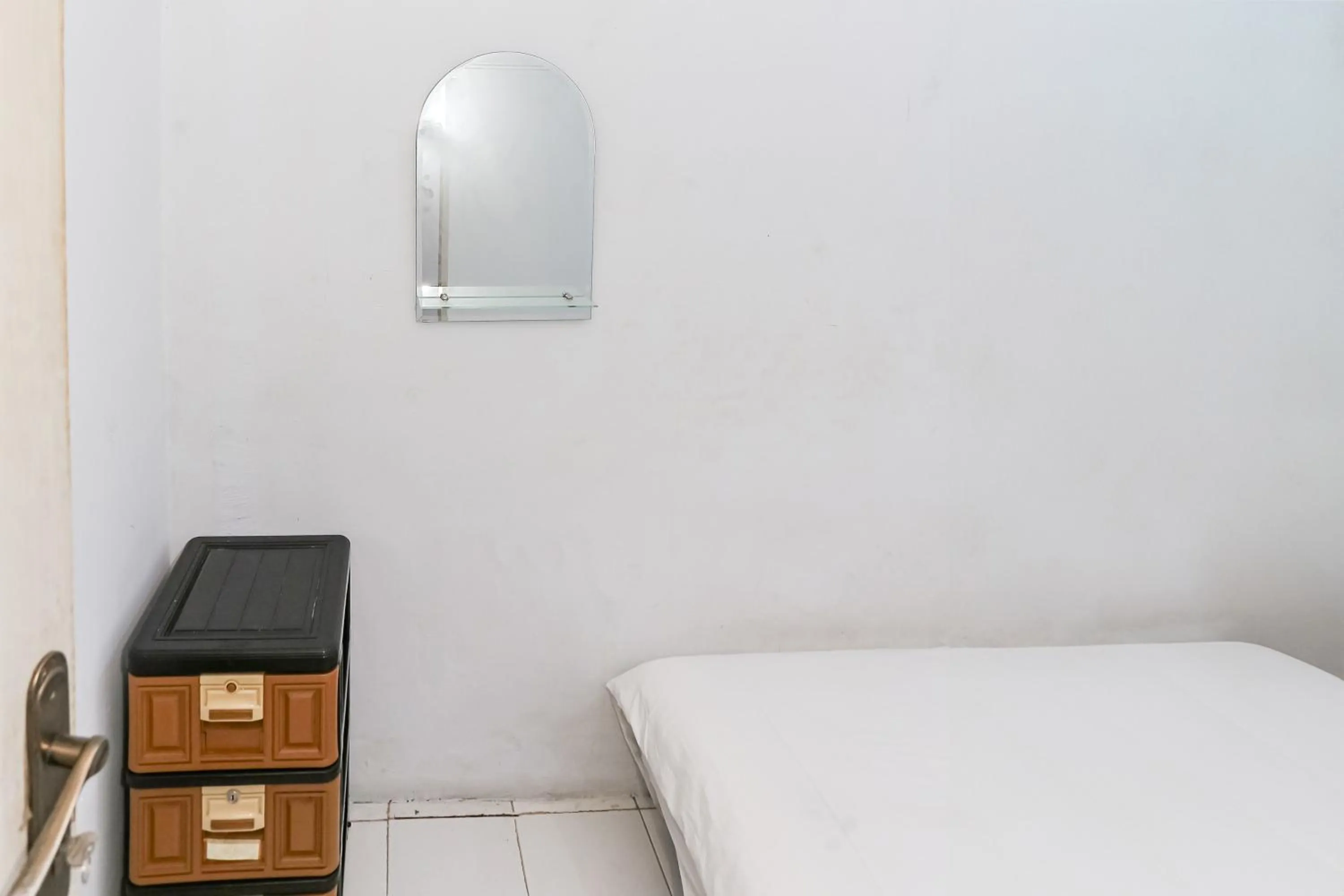 Bedroom in SPOT ON 93515 Pulo Gebang Guest House