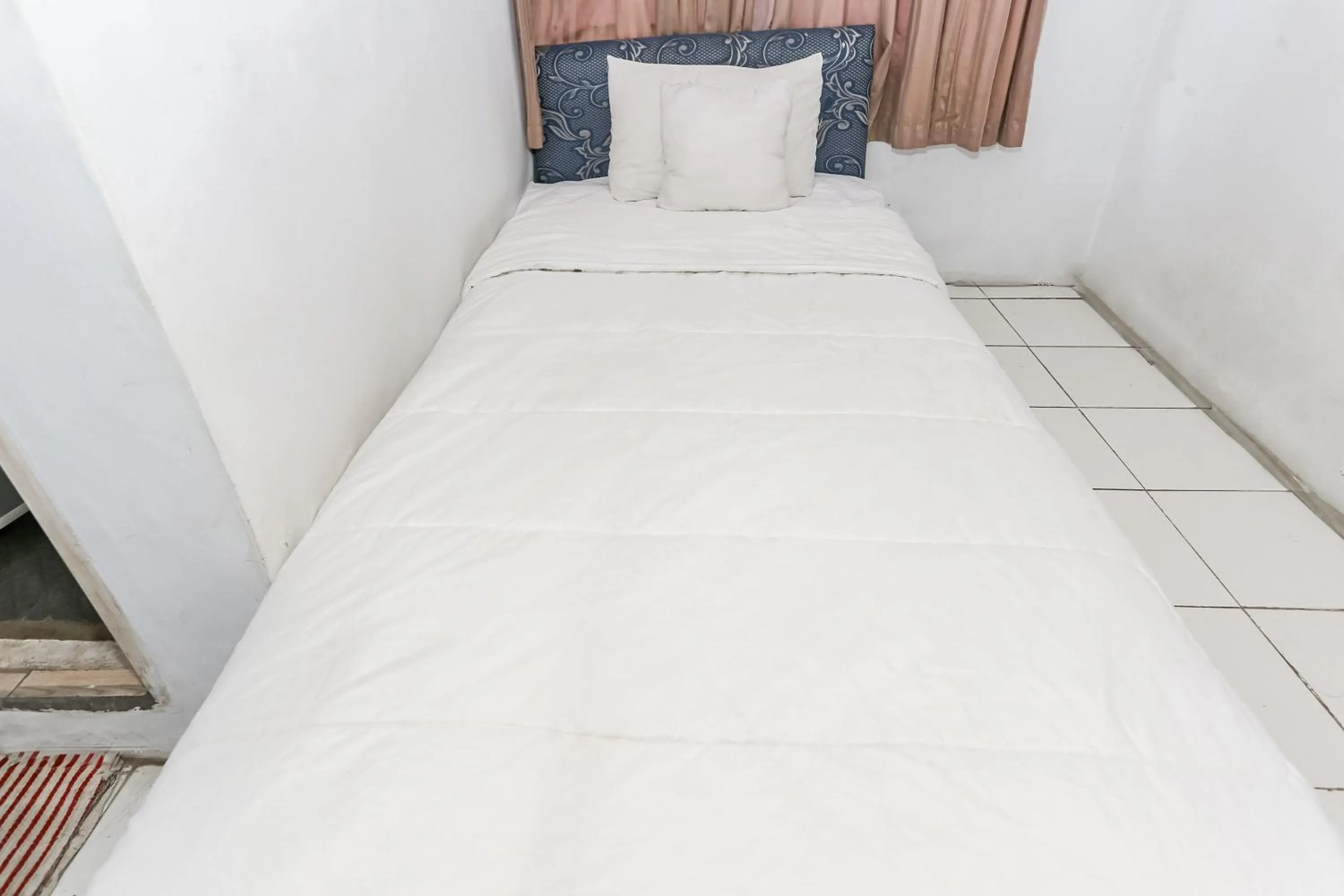 Bedroom in SPOT ON 93515 Pulo Gebang Guest House