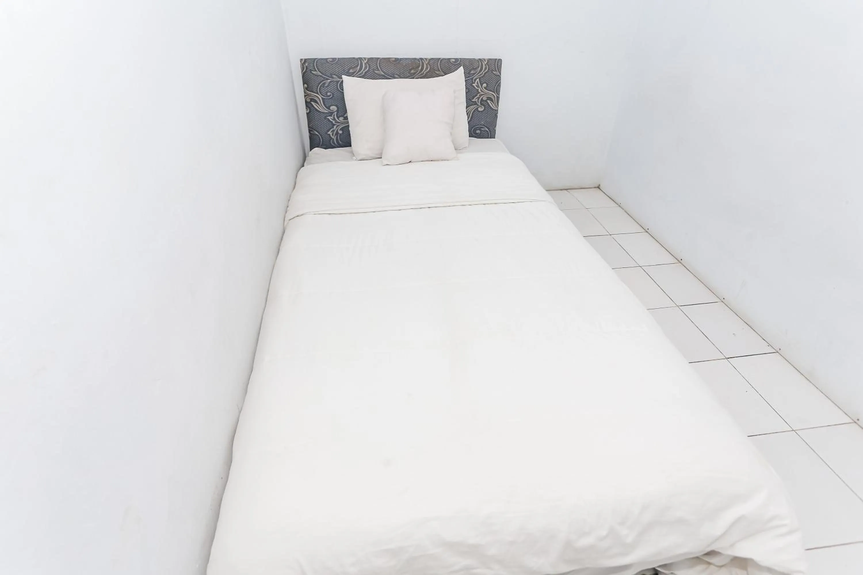 Bedroom in SPOT ON 93515 Pulo Gebang Guest House