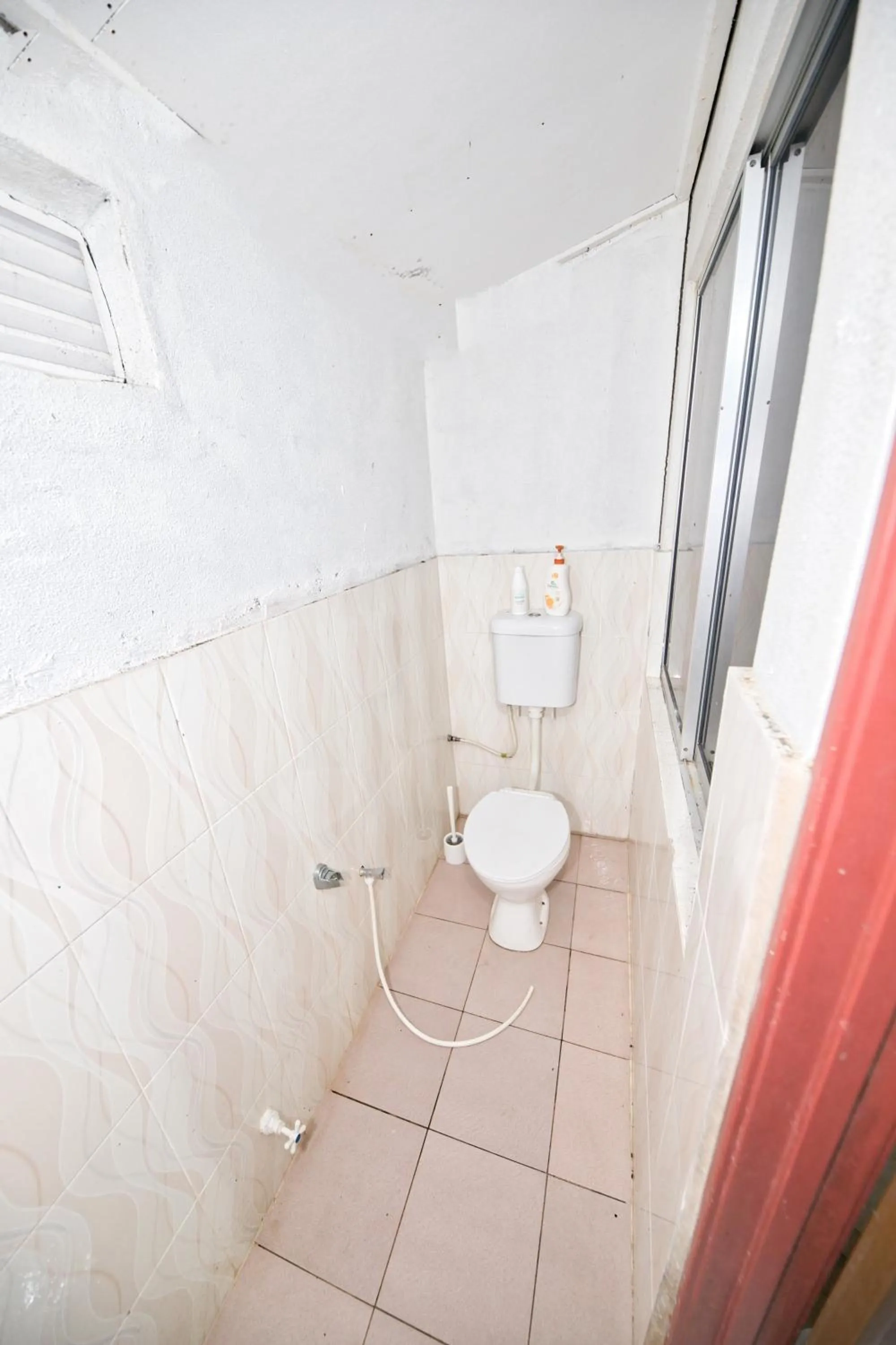 Bathroom in OYO 90915 Ilham Villa