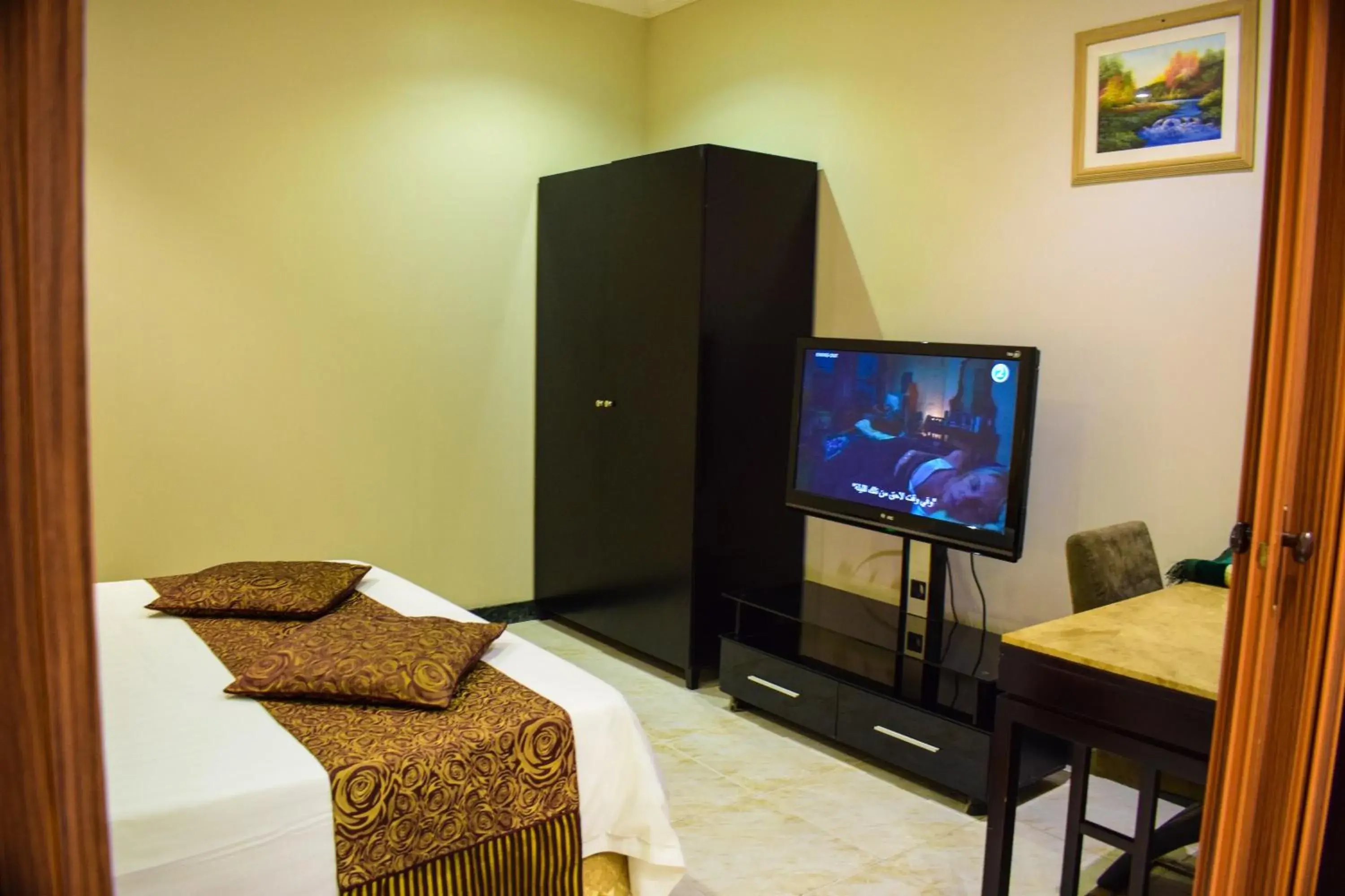 Bed in Arjan Qurtuba Served Apartments Bed in Arjan Qurtuba Served Apartments