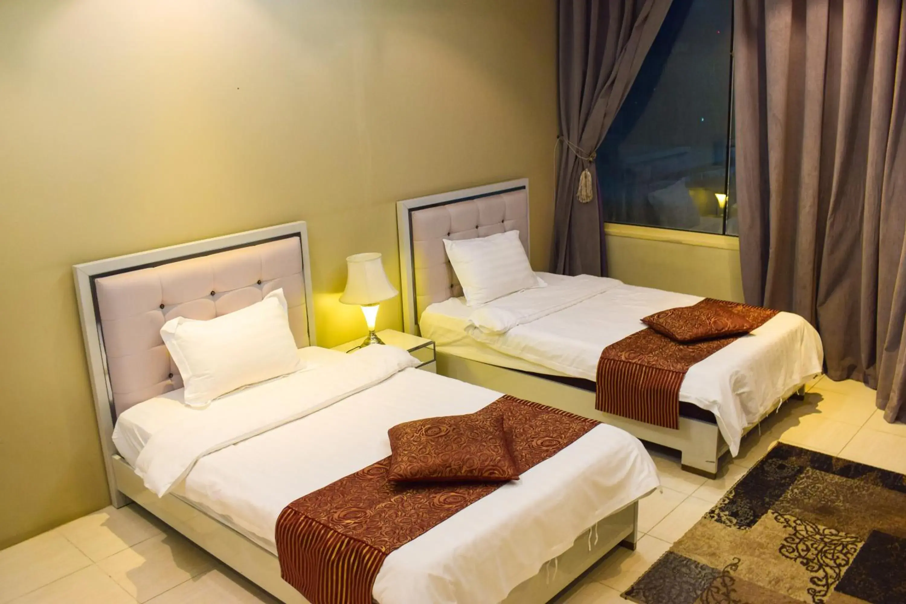 Bed in Arjan Qurtuba Served Apartments Bed in Arjan Qurtuba Served Apartments