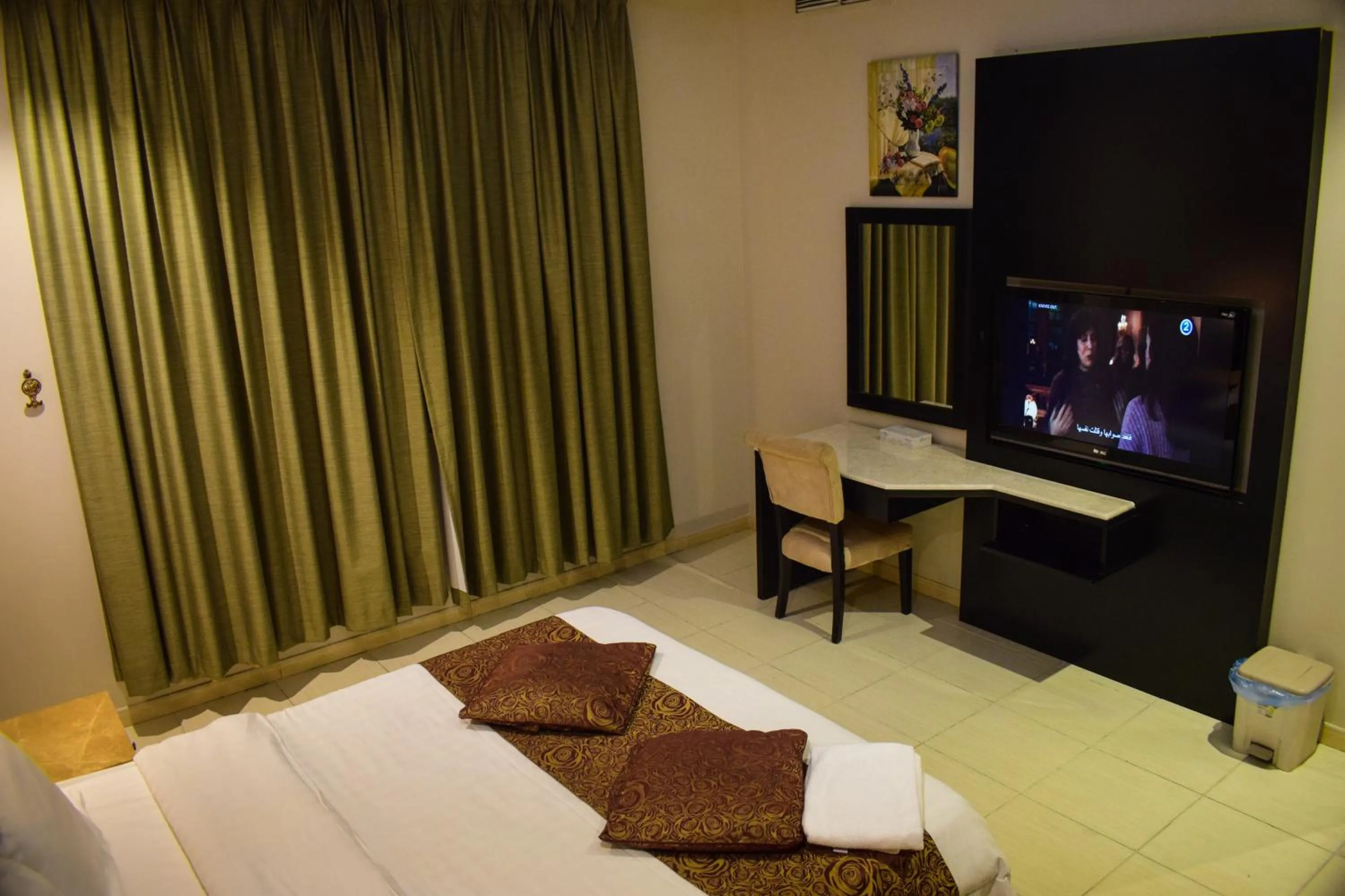 Bed in Arjan Qurtuba Served Apartments