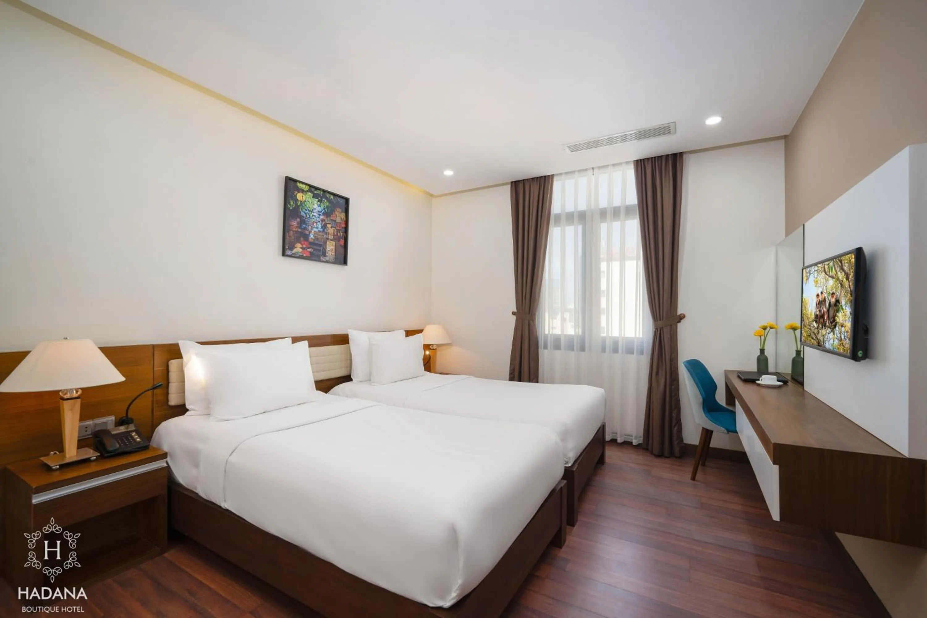 Bed in Hadana Boutique Hotel Danang