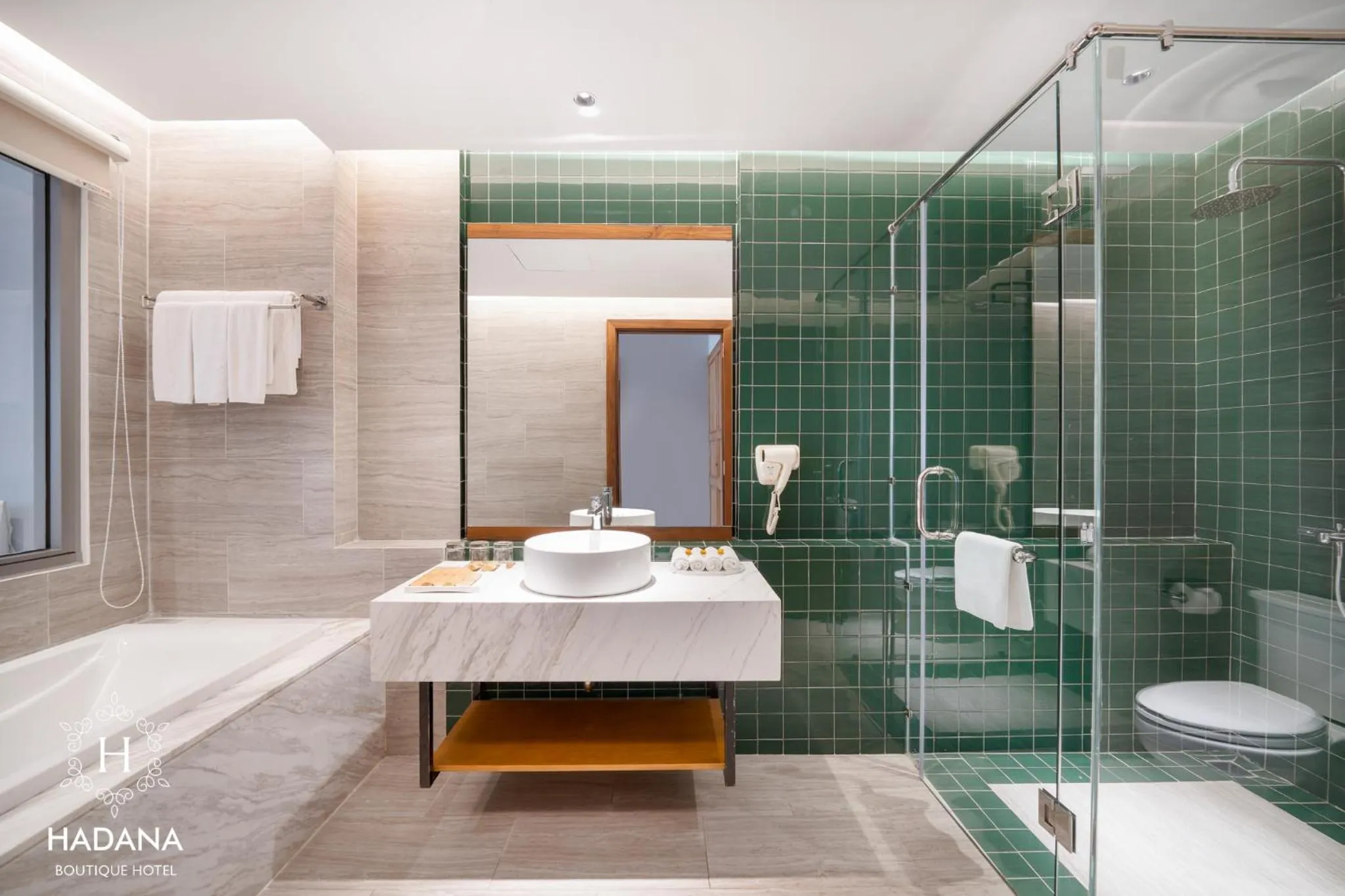 Shower in Hadana Boutique Hotel Danang