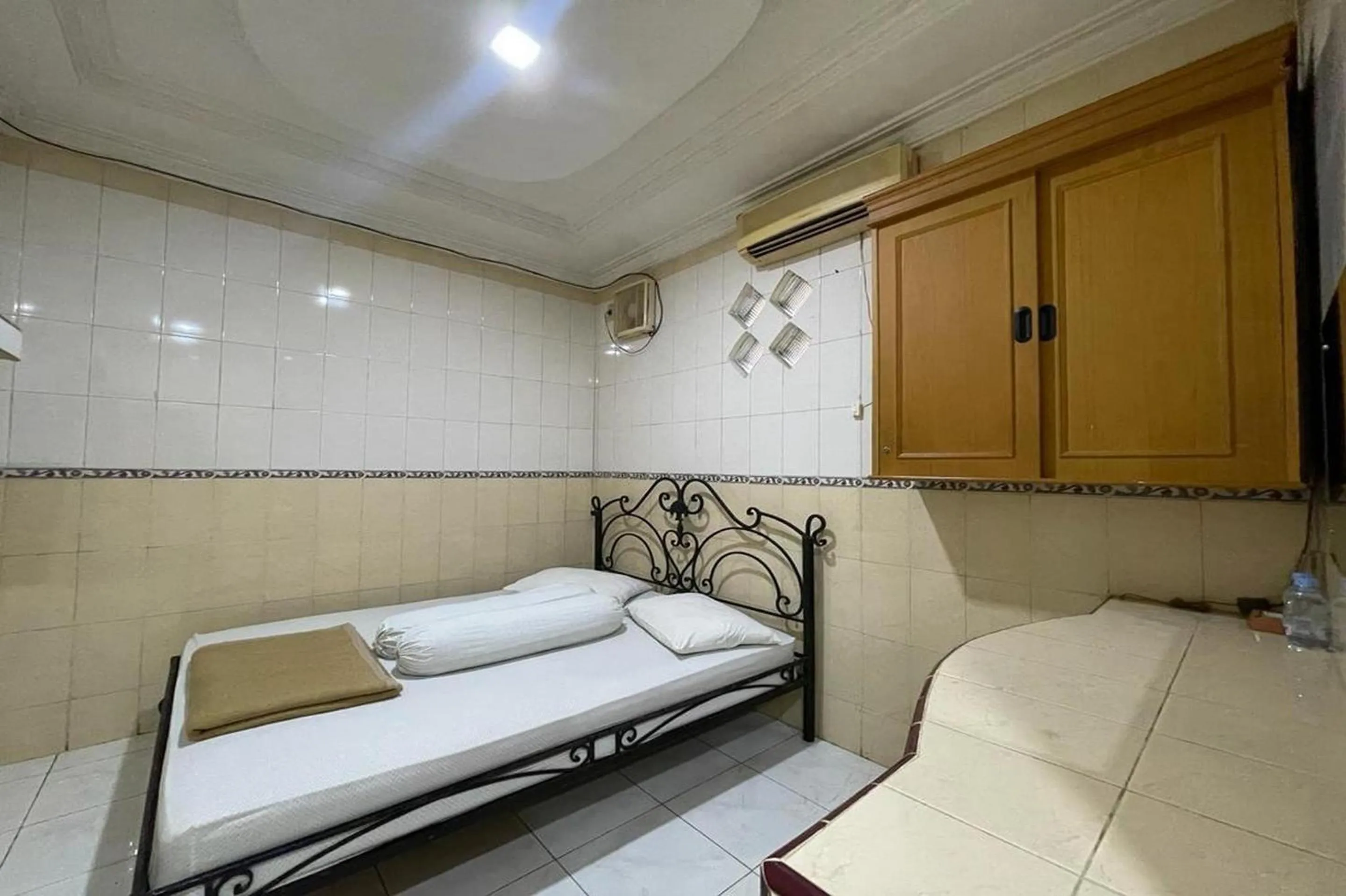 Bedroom, Bed in Hotel O Homestay Pakmuklis Syariah 2 Near Taman Mini Lhokseumawe