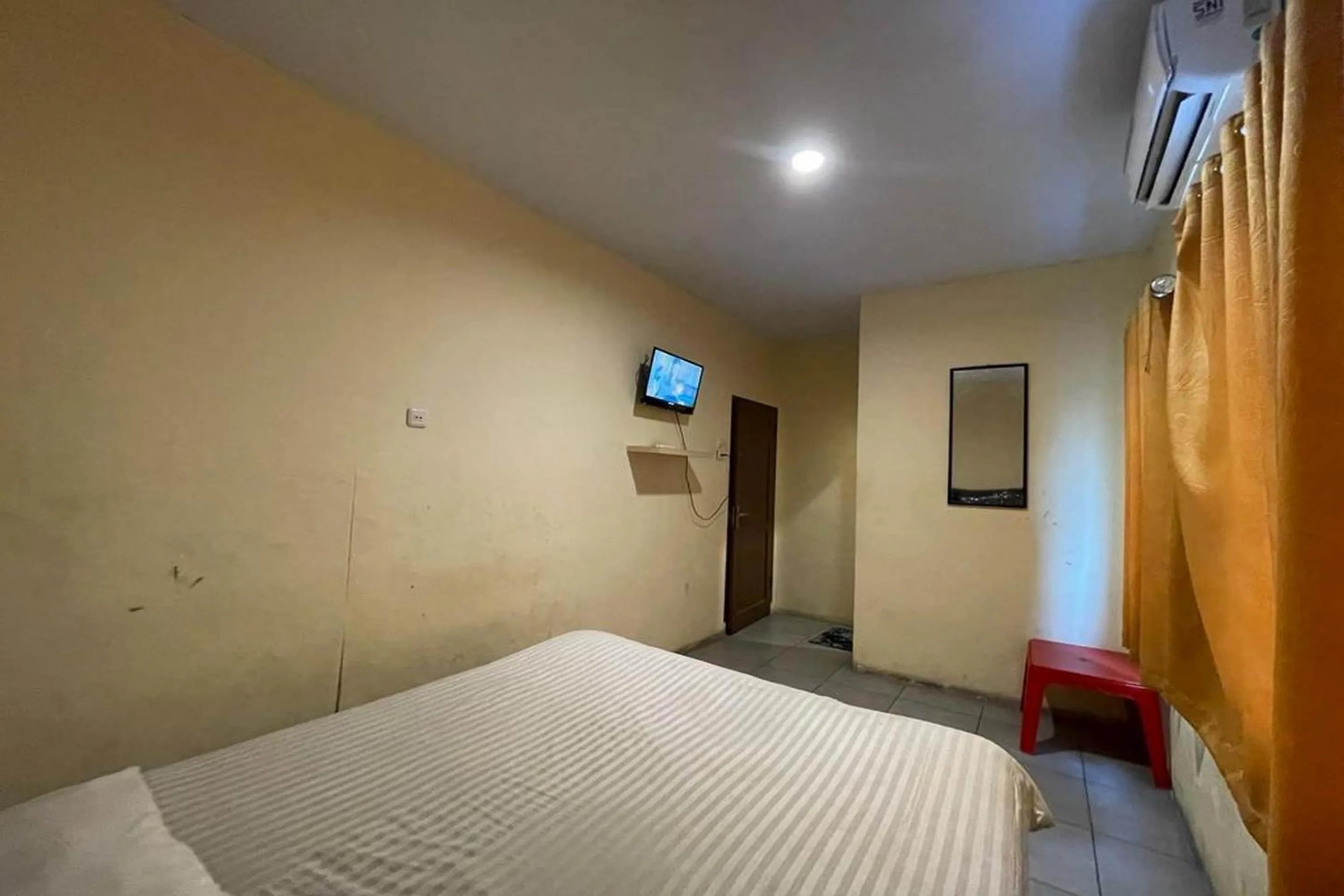 Bedroom in Hotel O Saril Riverside HomestayNearLapangan Musara Alun