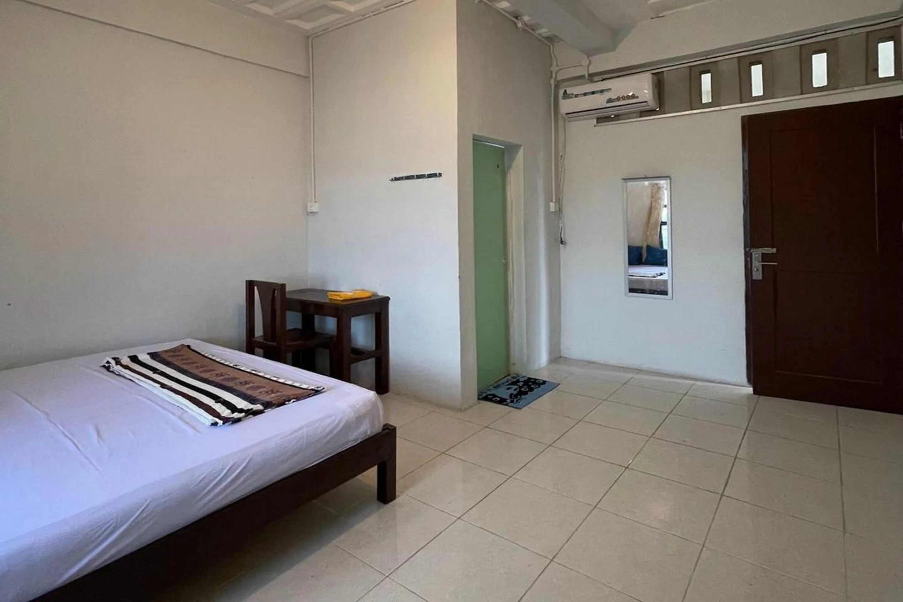 Bedroom in Hotel O Saril Riverside HomestayNearLapangan Musara Alun