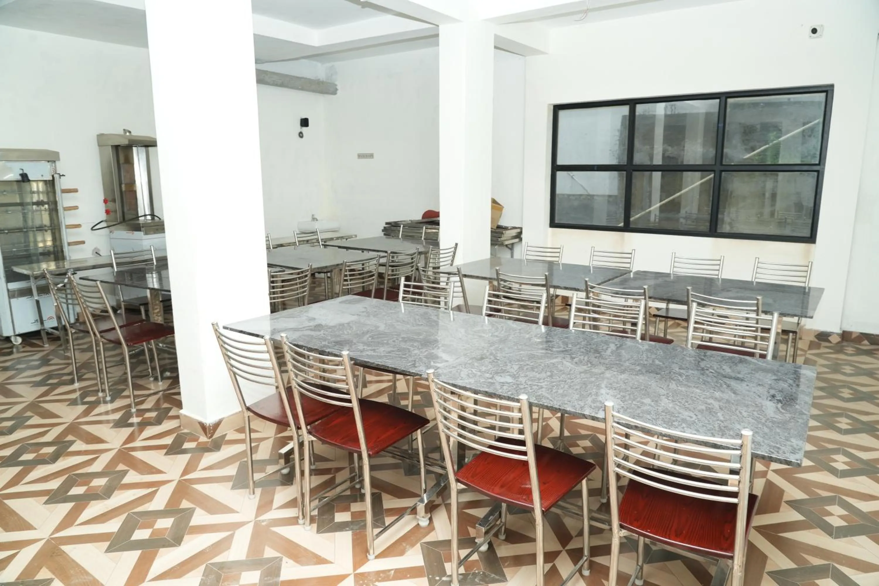 Kitchen or kitchenette in Vetrivel International by Brown Tree Resorts