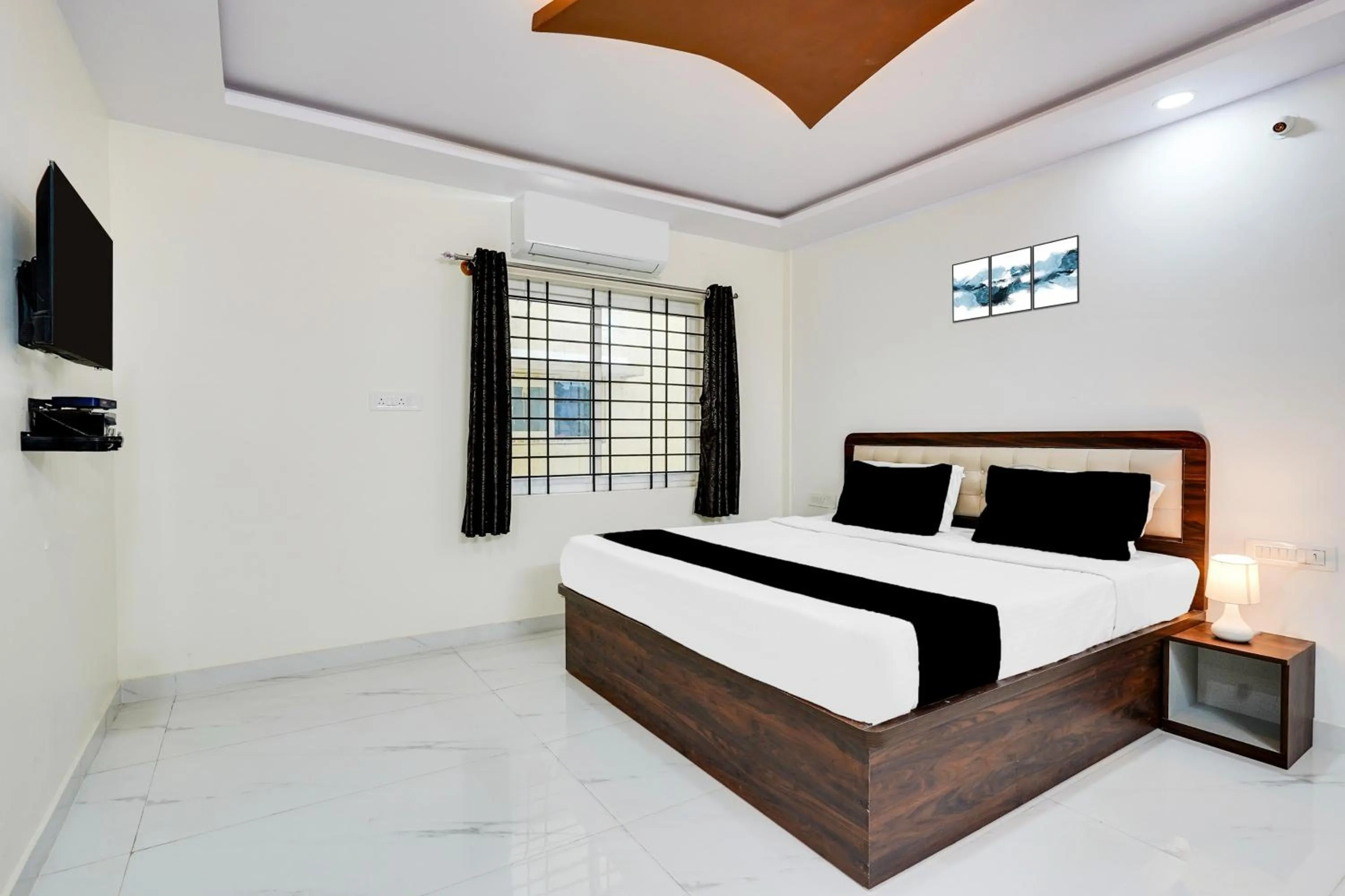 Bedroom in Super Townhouse Bidadi Formerly Royal Garuda