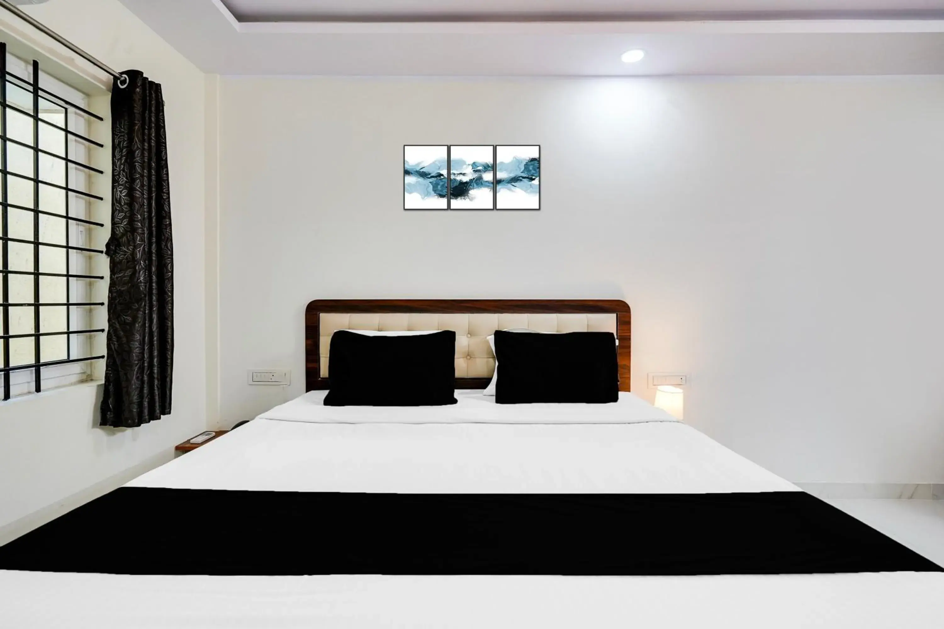 Bedroom in Super Townhouse Bidadi Formerly Royal Garuda Bedroom in Super Townhouse Bidadi Formerly Royal Garuda