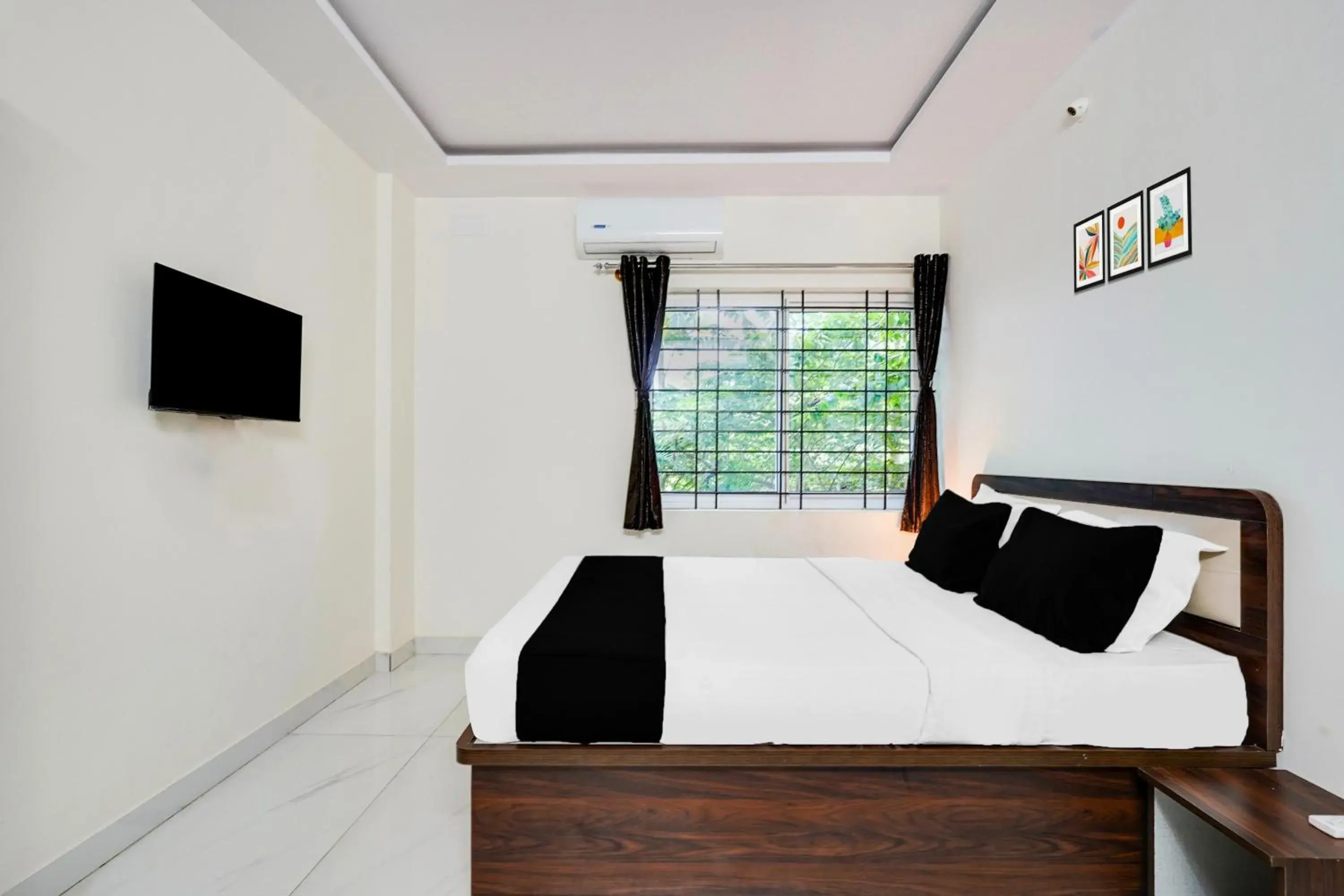 Bedroom in Super Townhouse Bidadi Formerly Royal Garuda Bedroom in Super Townhouse Bidadi Formerly Royal Garuda