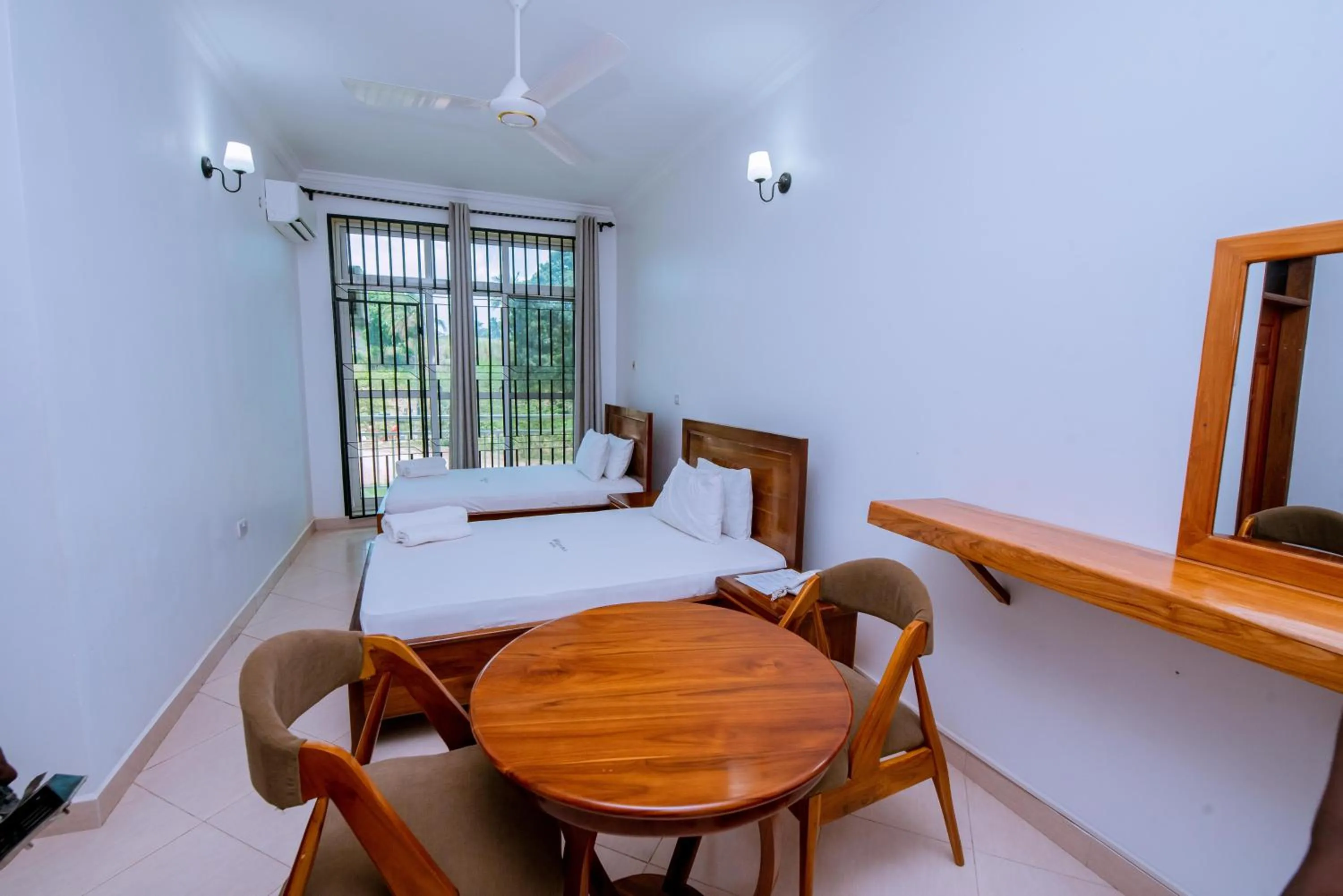 Bed in WILIVINA HOTEL