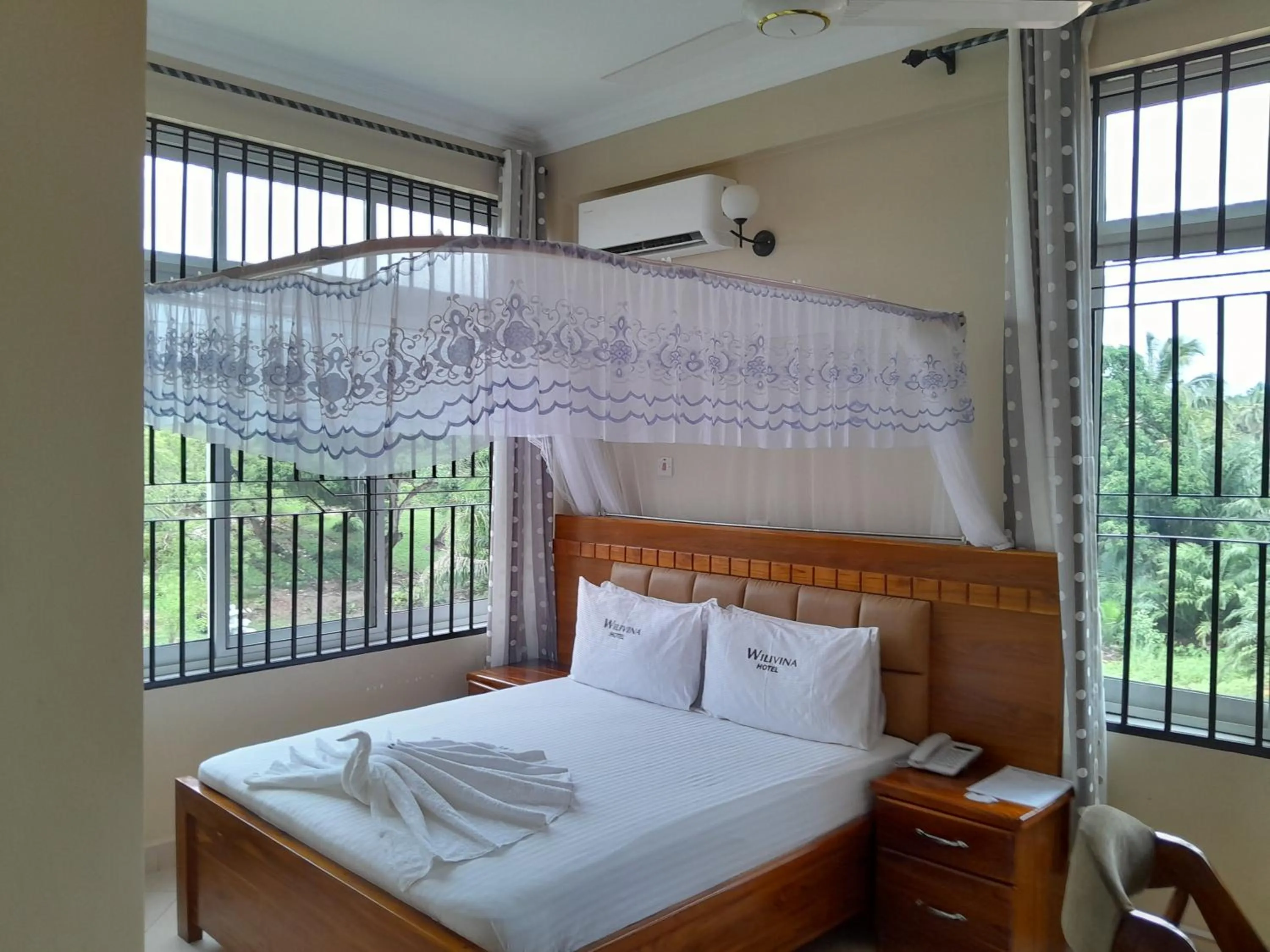 Bed in WILIVINA HOTEL