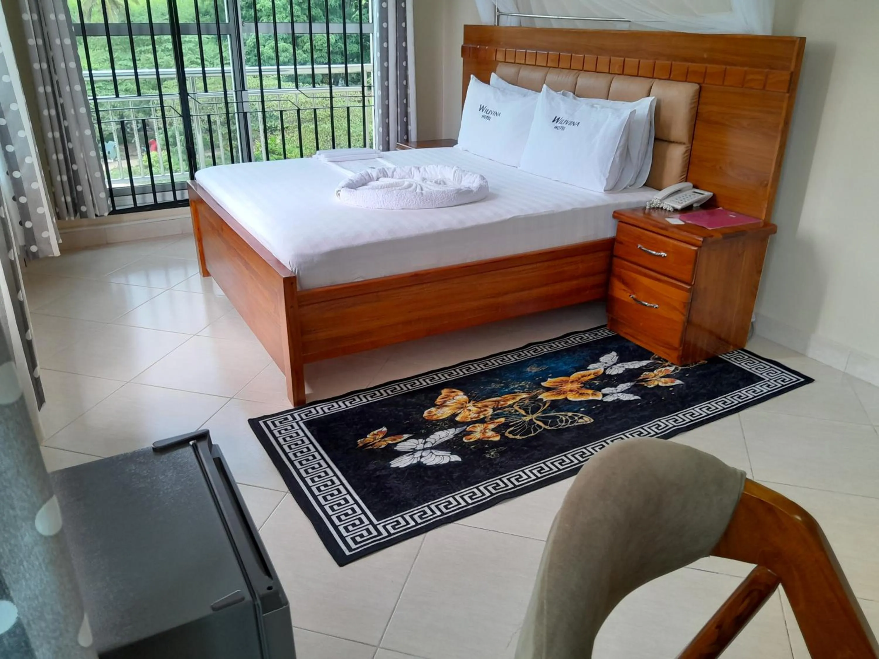 Bed in WILIVINA HOTEL