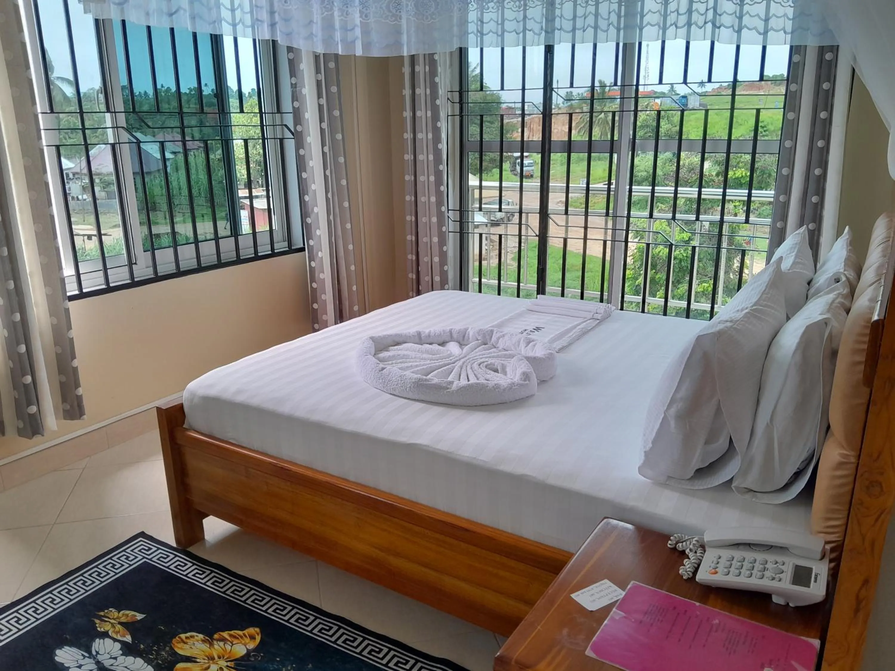 View (from property/room), Bed in WILIVINA HOTEL