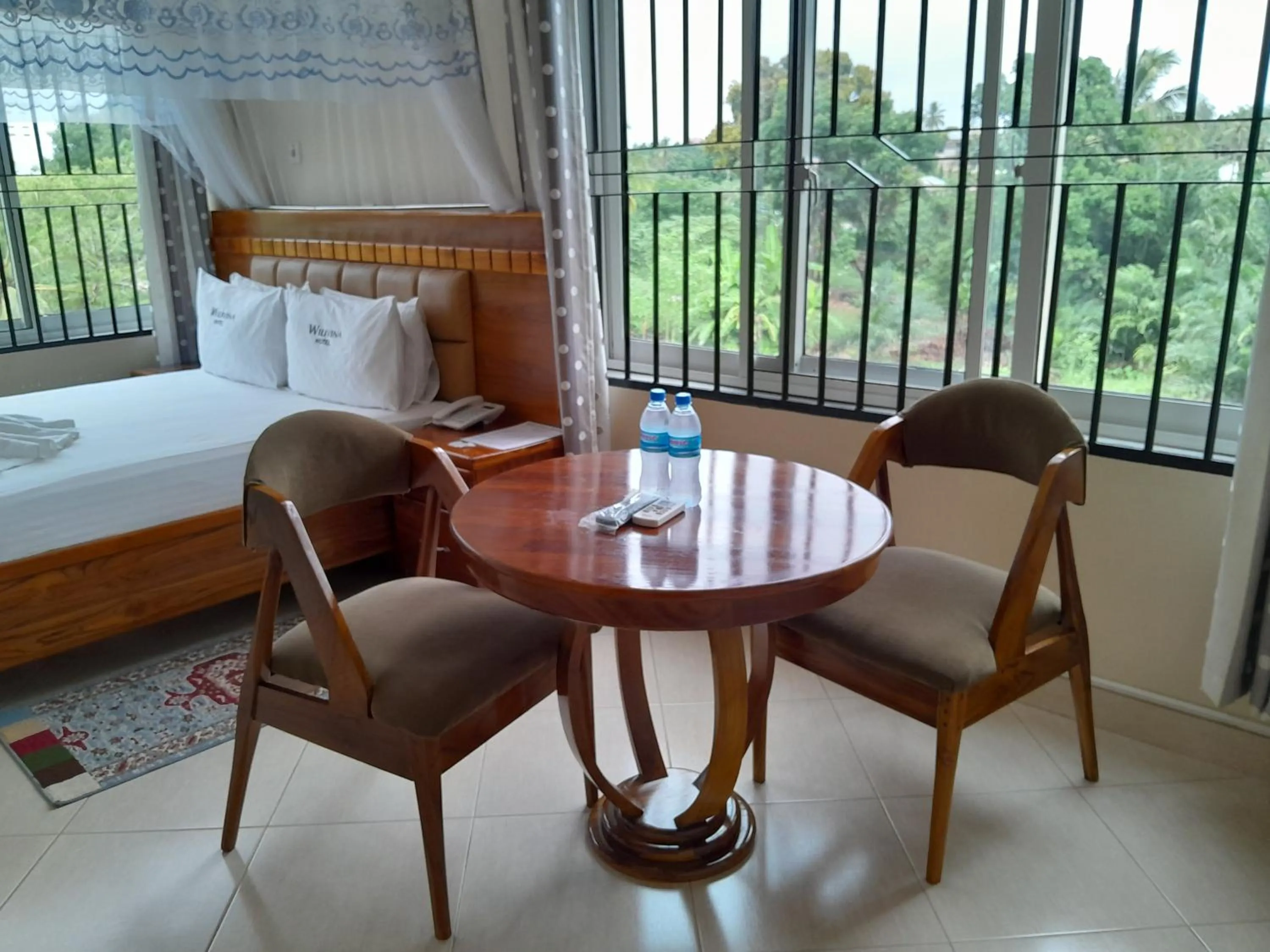 Bed in WILIVINA HOTEL