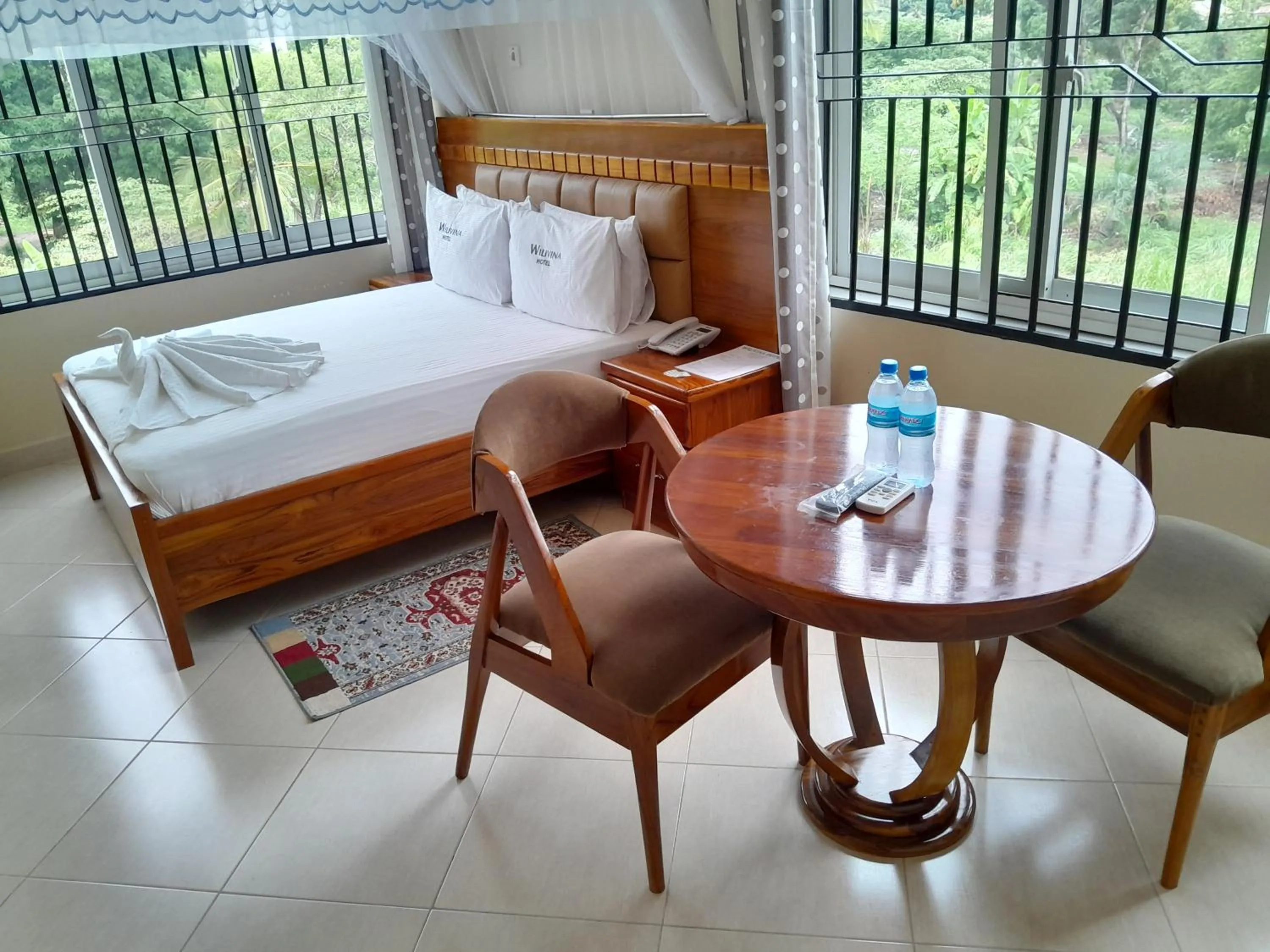 Seating area, Bed in WILIVINA HOTEL