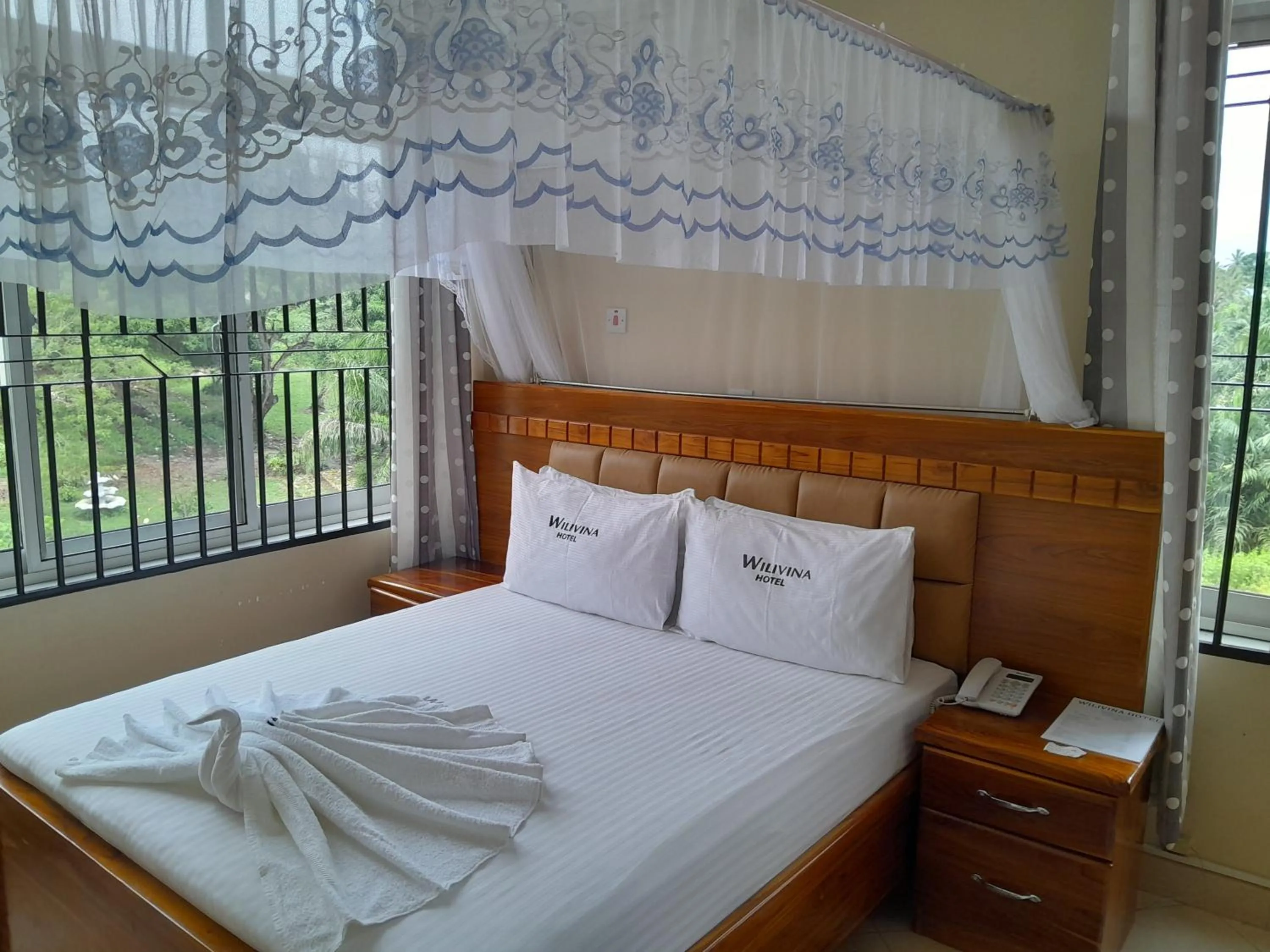 Bed in WILIVINA HOTEL