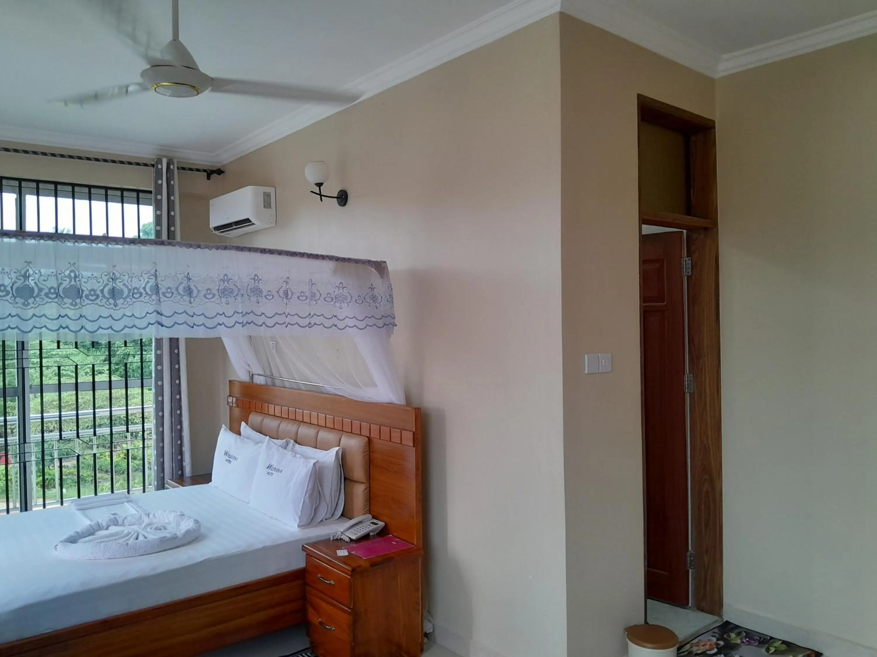 Bed in WILIVINA HOTEL