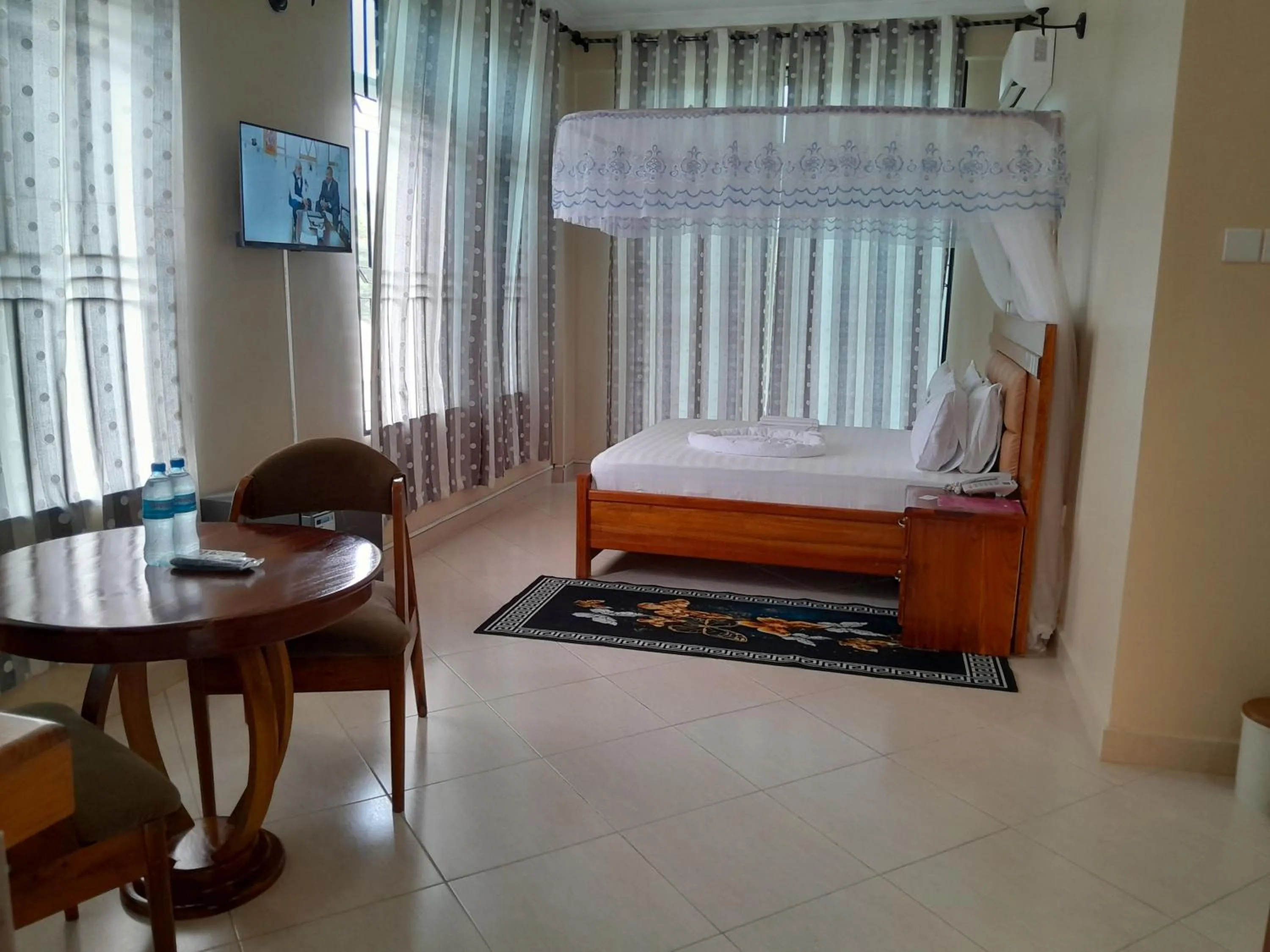 Living room, Bed in WILIVINA HOTEL