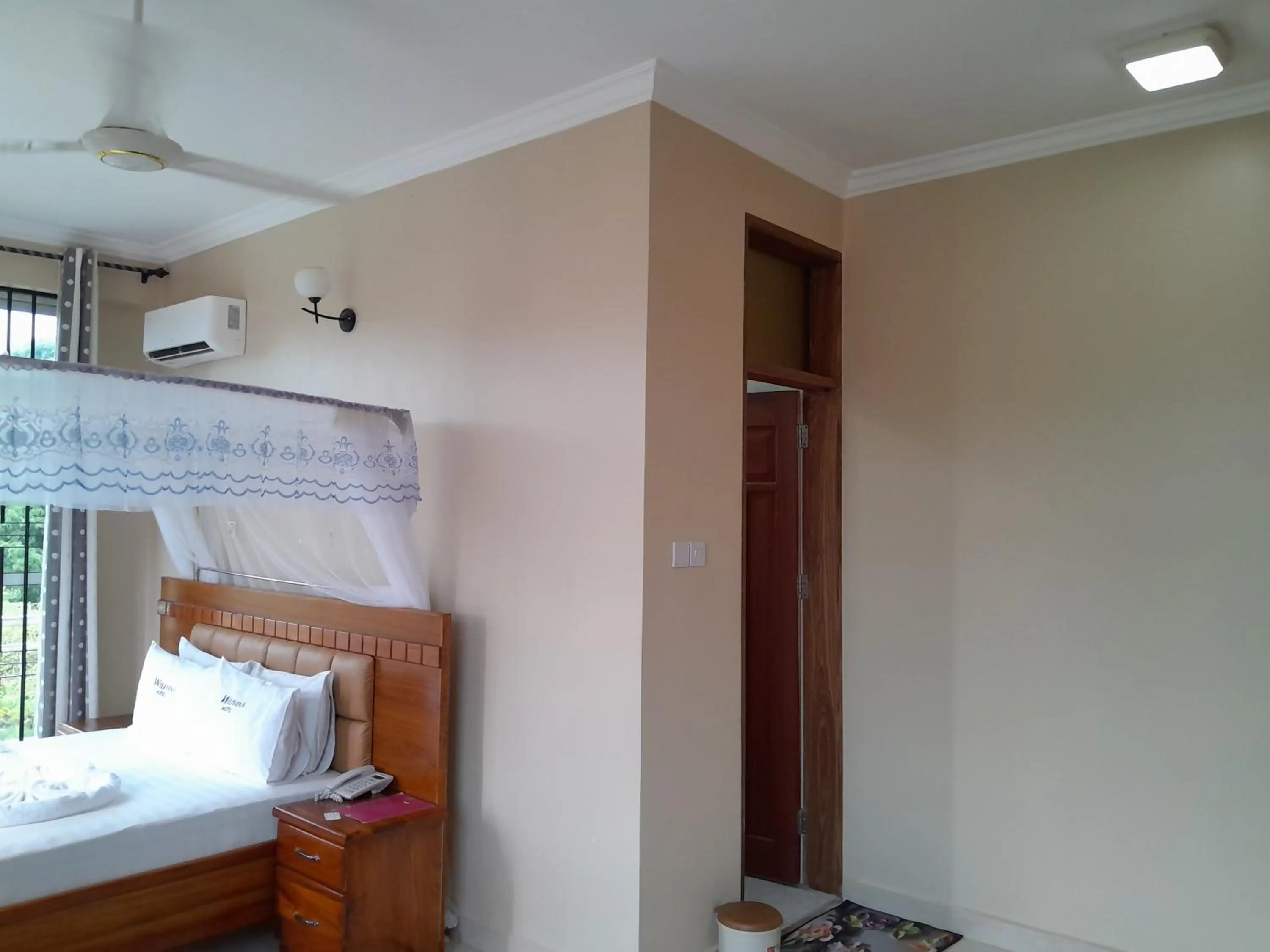 Bed in WILIVINA HOTEL