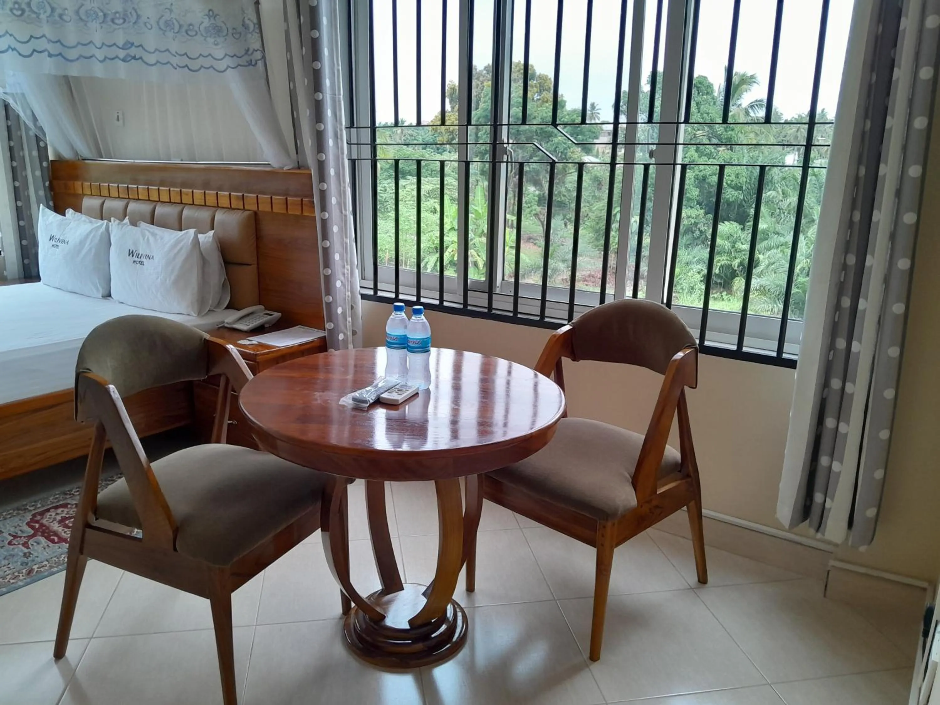 View (from property/room), Bed in WILIVINA HOTEL