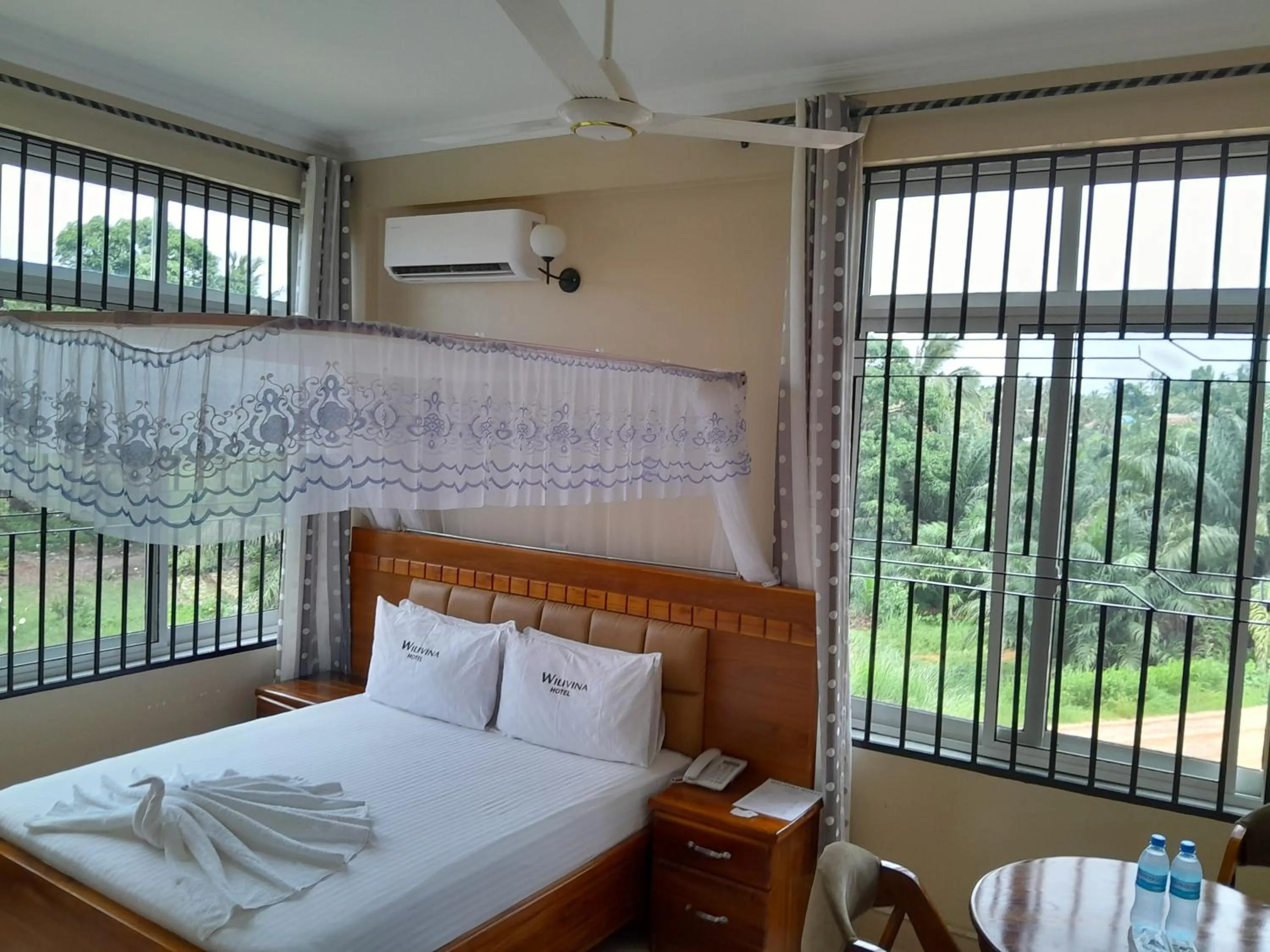 towels, Bed in WILIVINA HOTEL