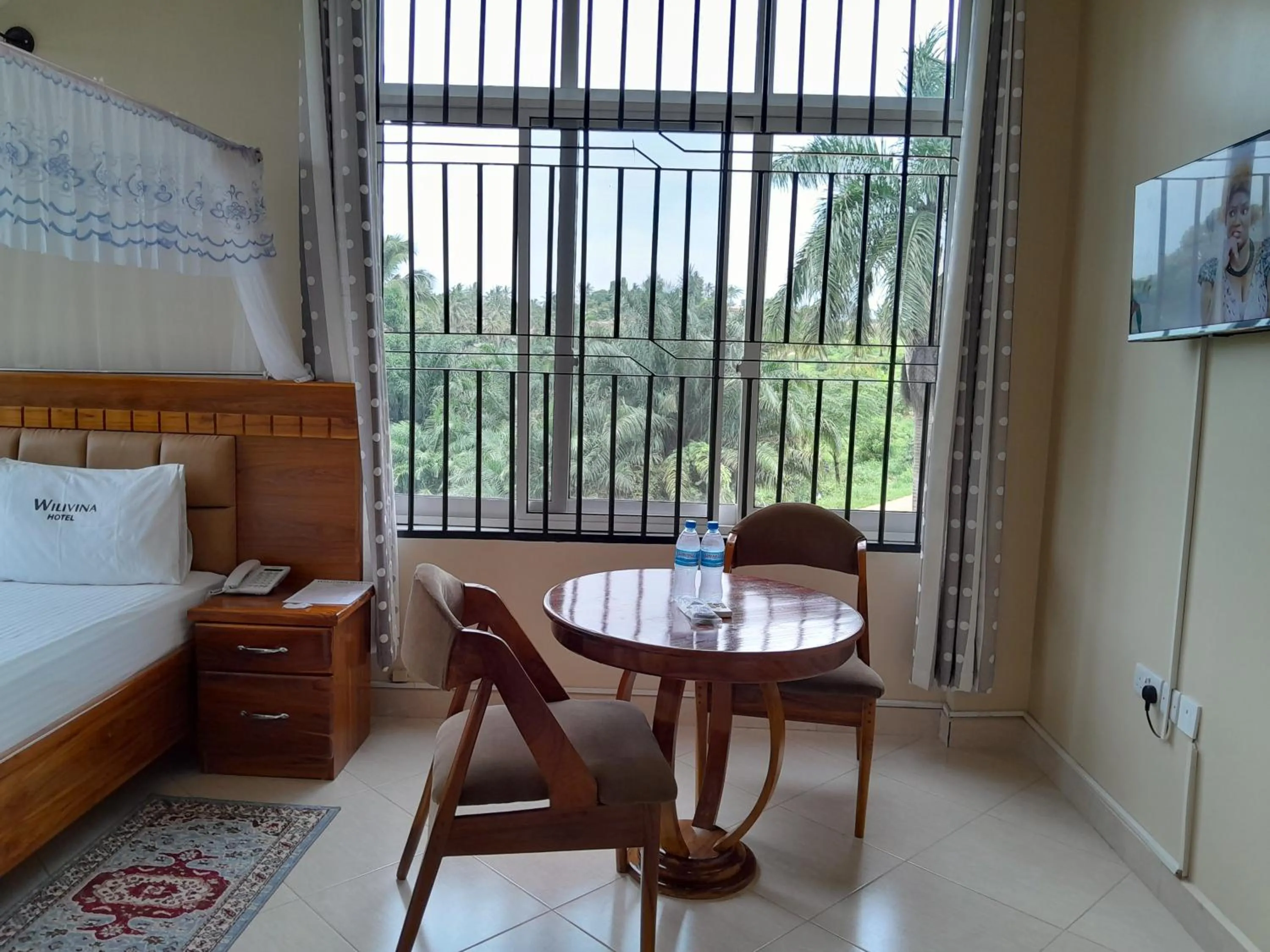 Dining area, Bed in WILIVINA HOTEL