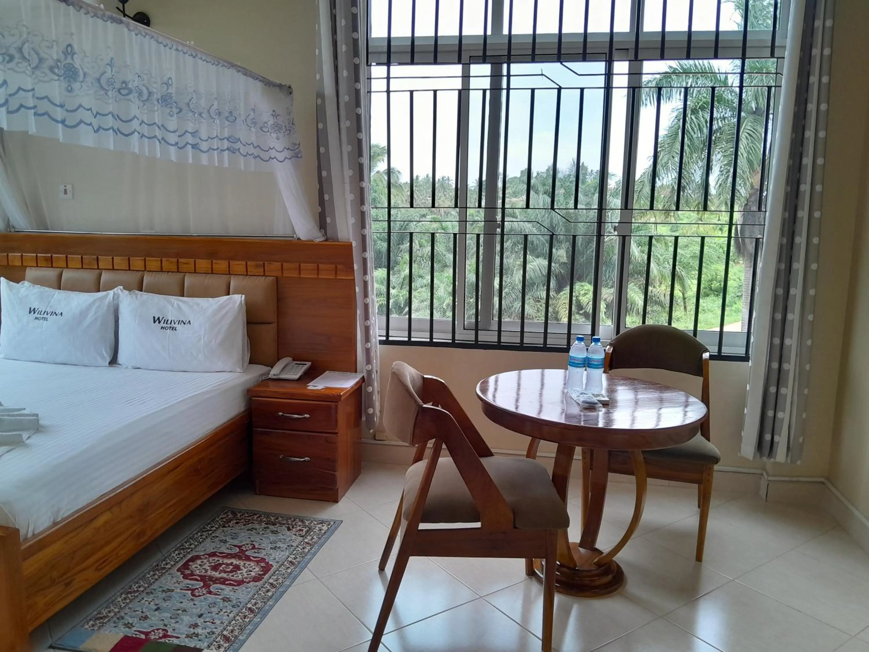 Bed in WILIVINA HOTEL