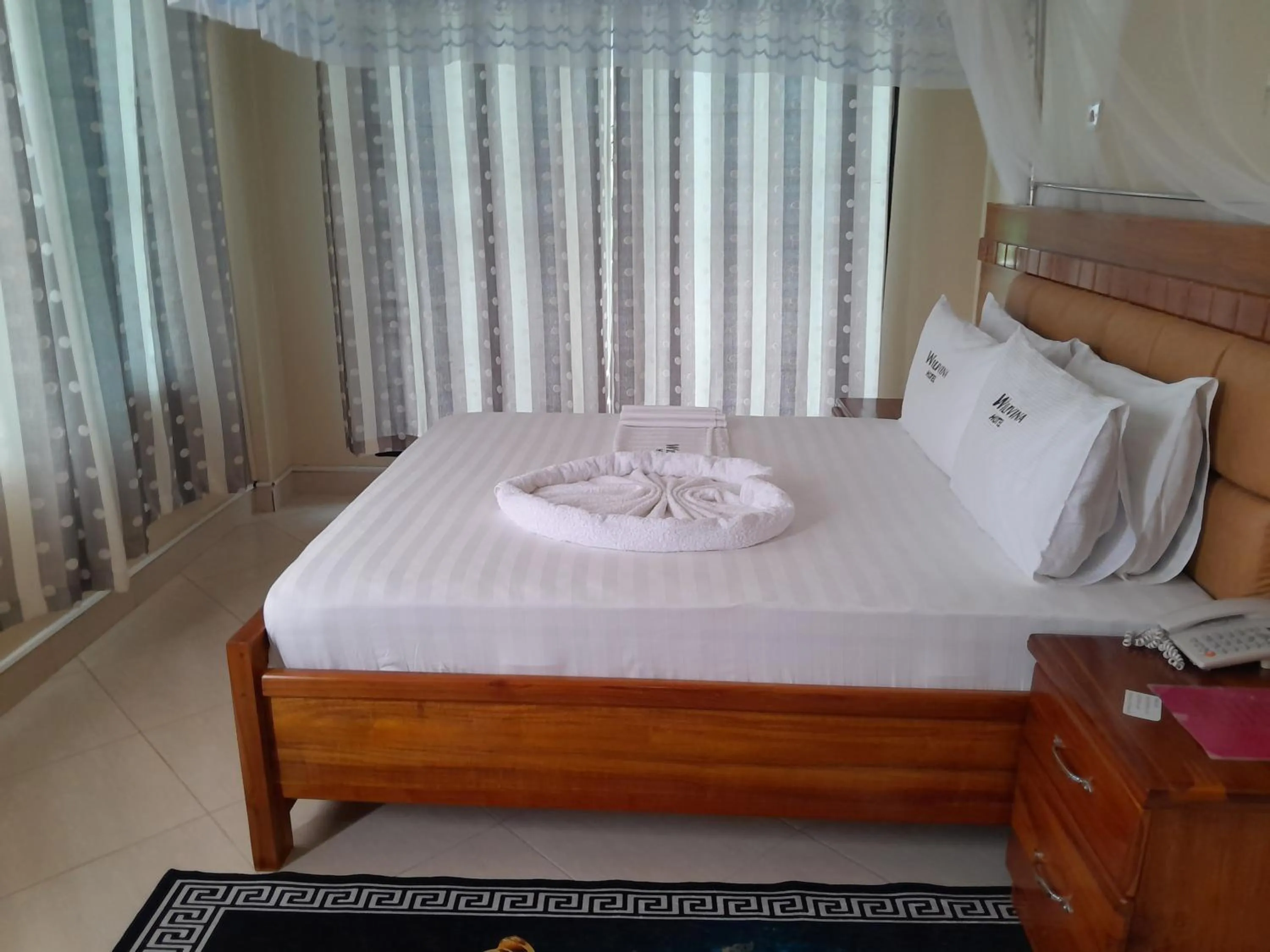 Bed in WILIVINA HOTEL
