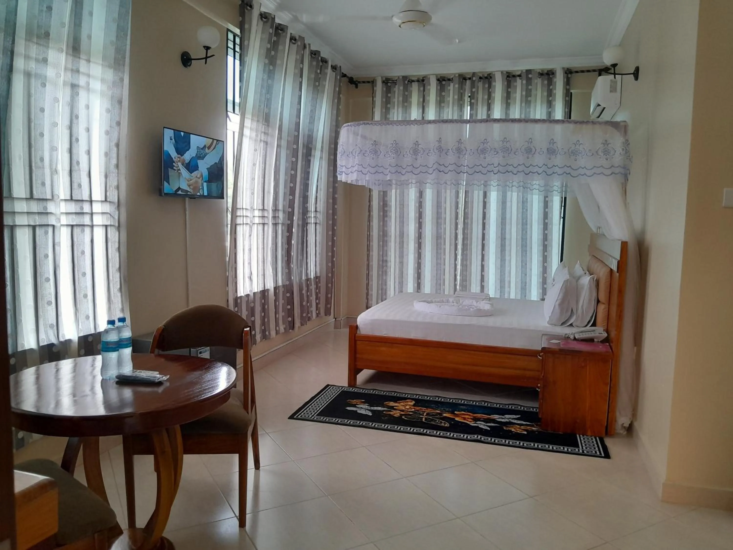 Living room, Bed in WILIVINA HOTEL