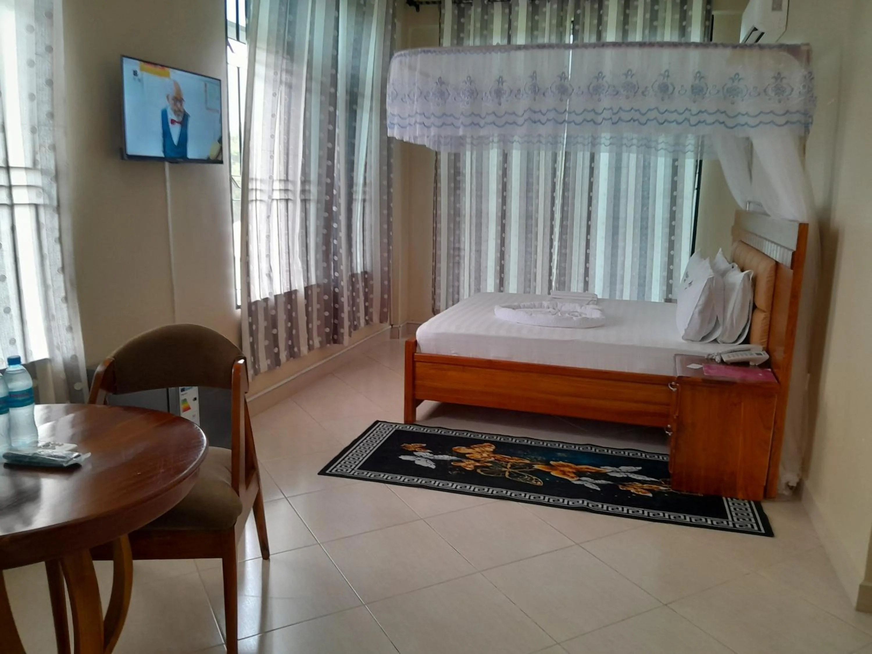 Bed in WILIVINA HOTEL