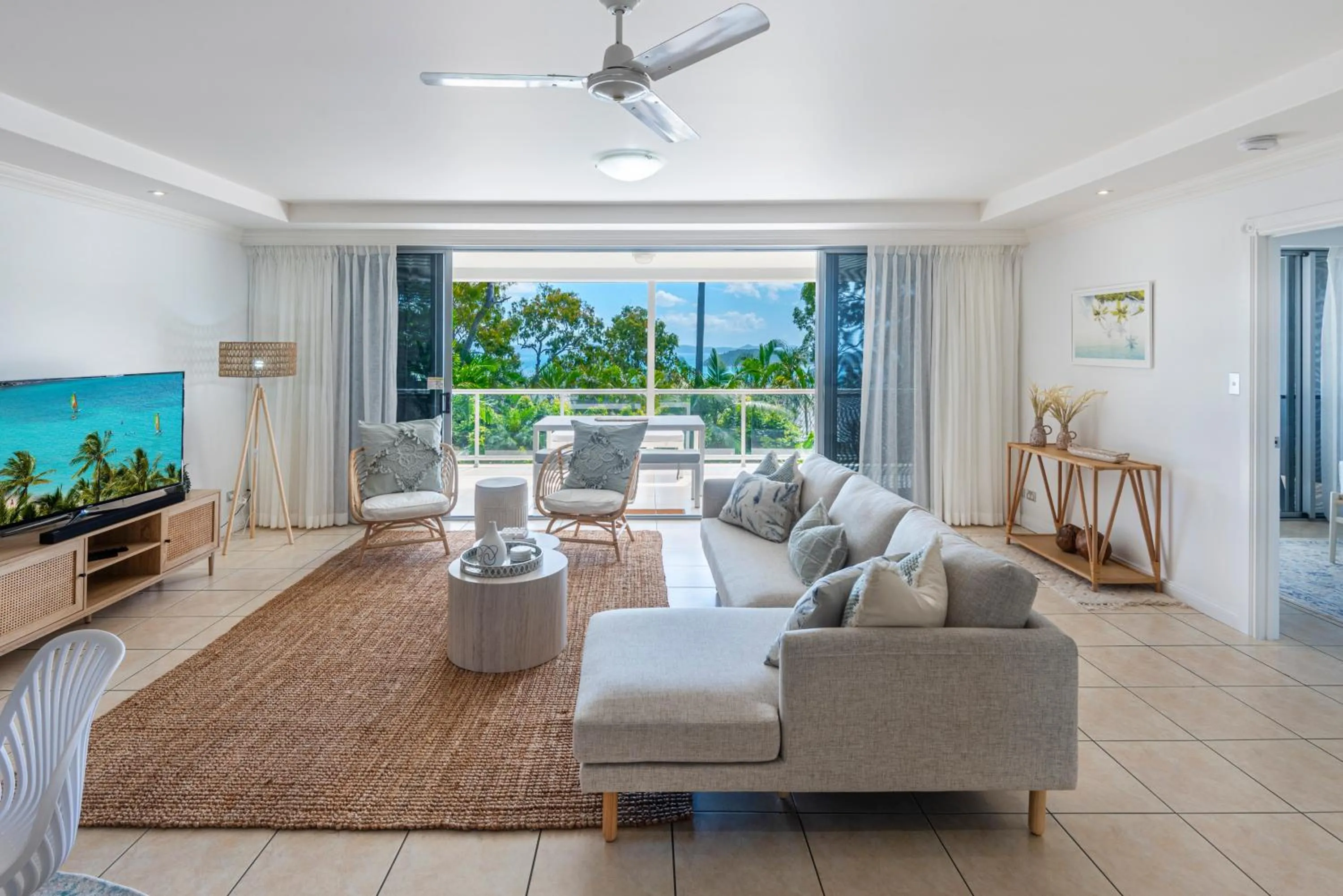 Living room in Blue Water Views on Hamilton Island by HIHA