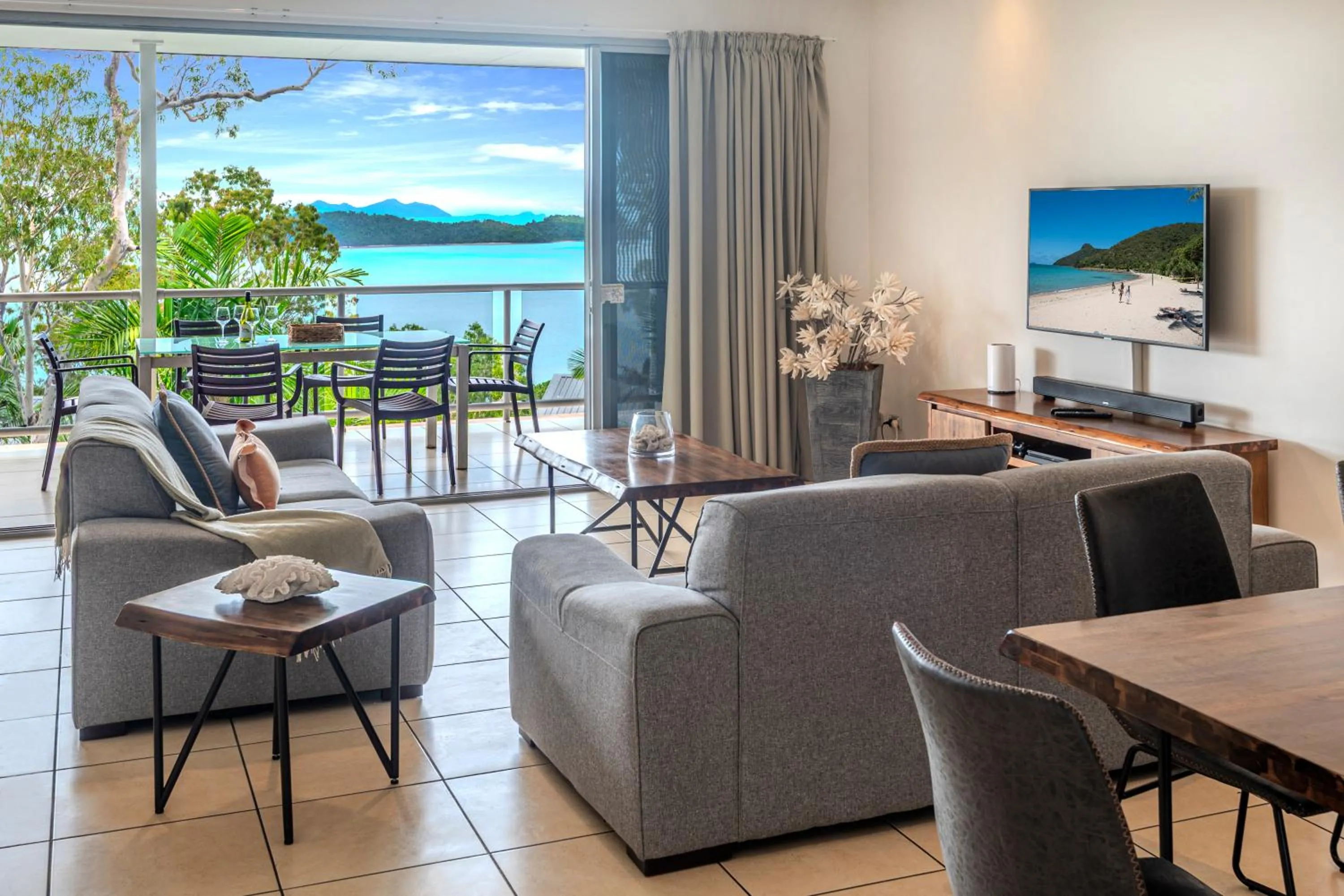 Living room in Blue Water Views on Hamilton Island by HIHA
