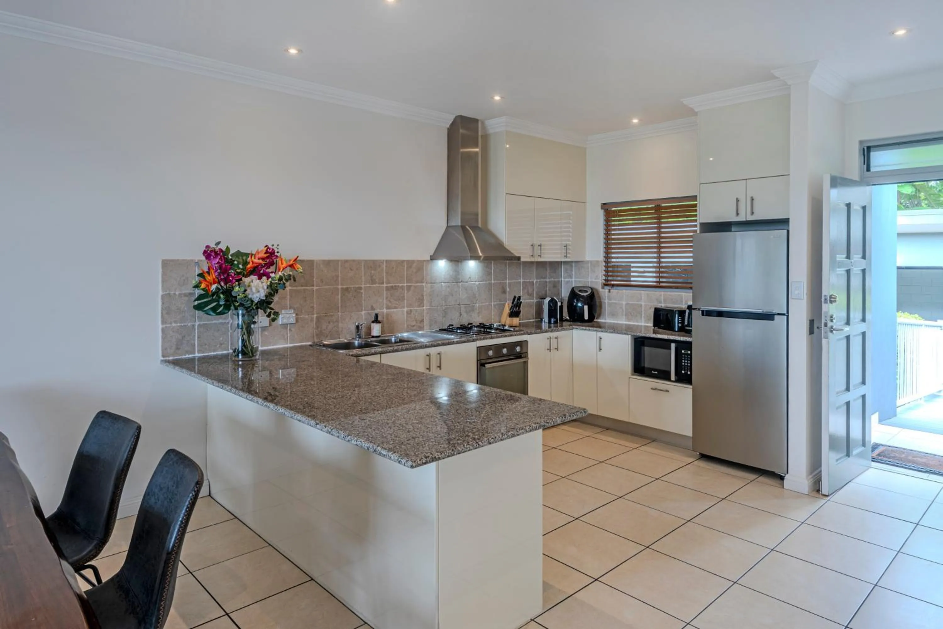 Kitchen or kitchenette in Blue Water Views on Hamilton Island by HIHA