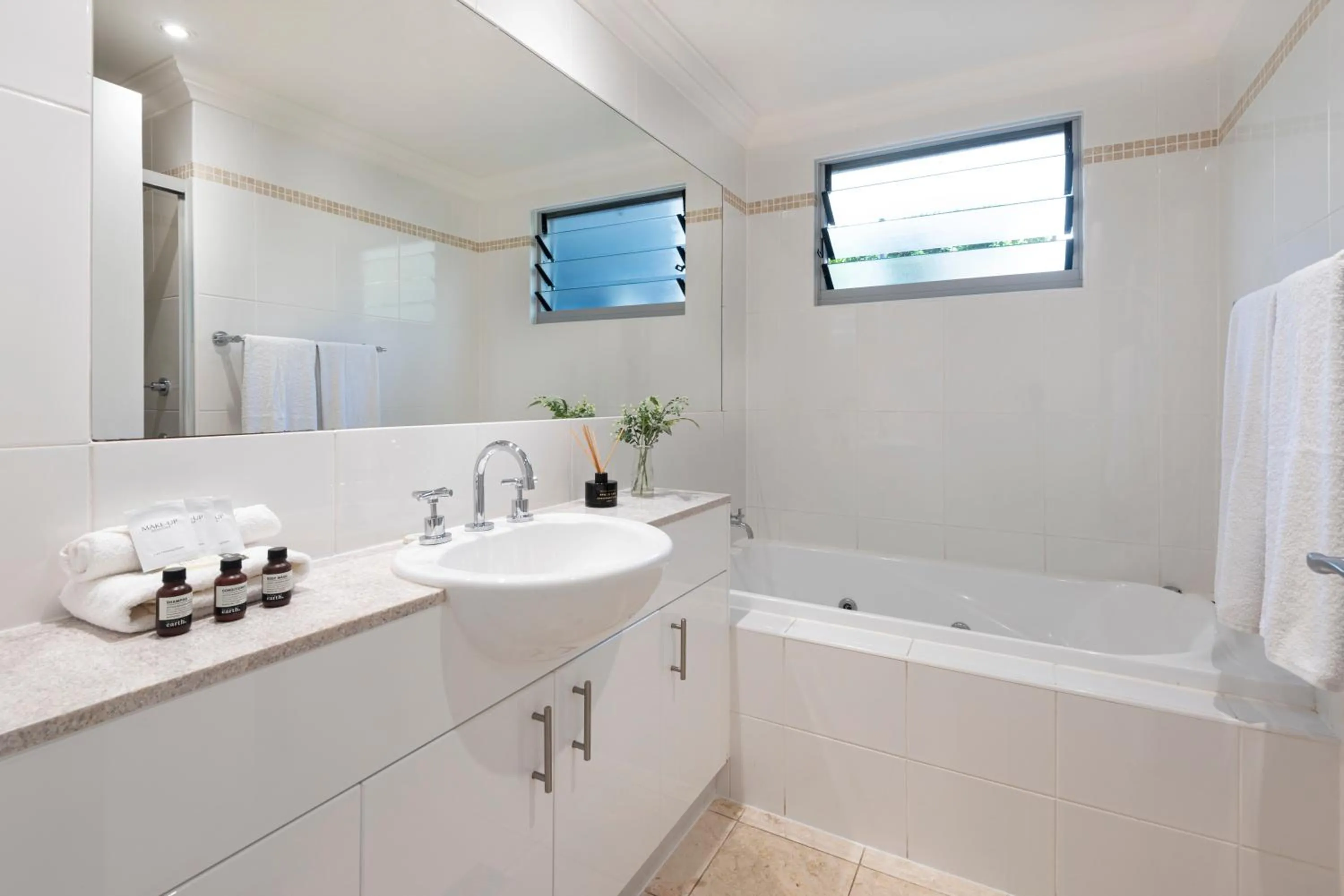 Bathroom in Blue Water Views on Hamilton Island by HIHA