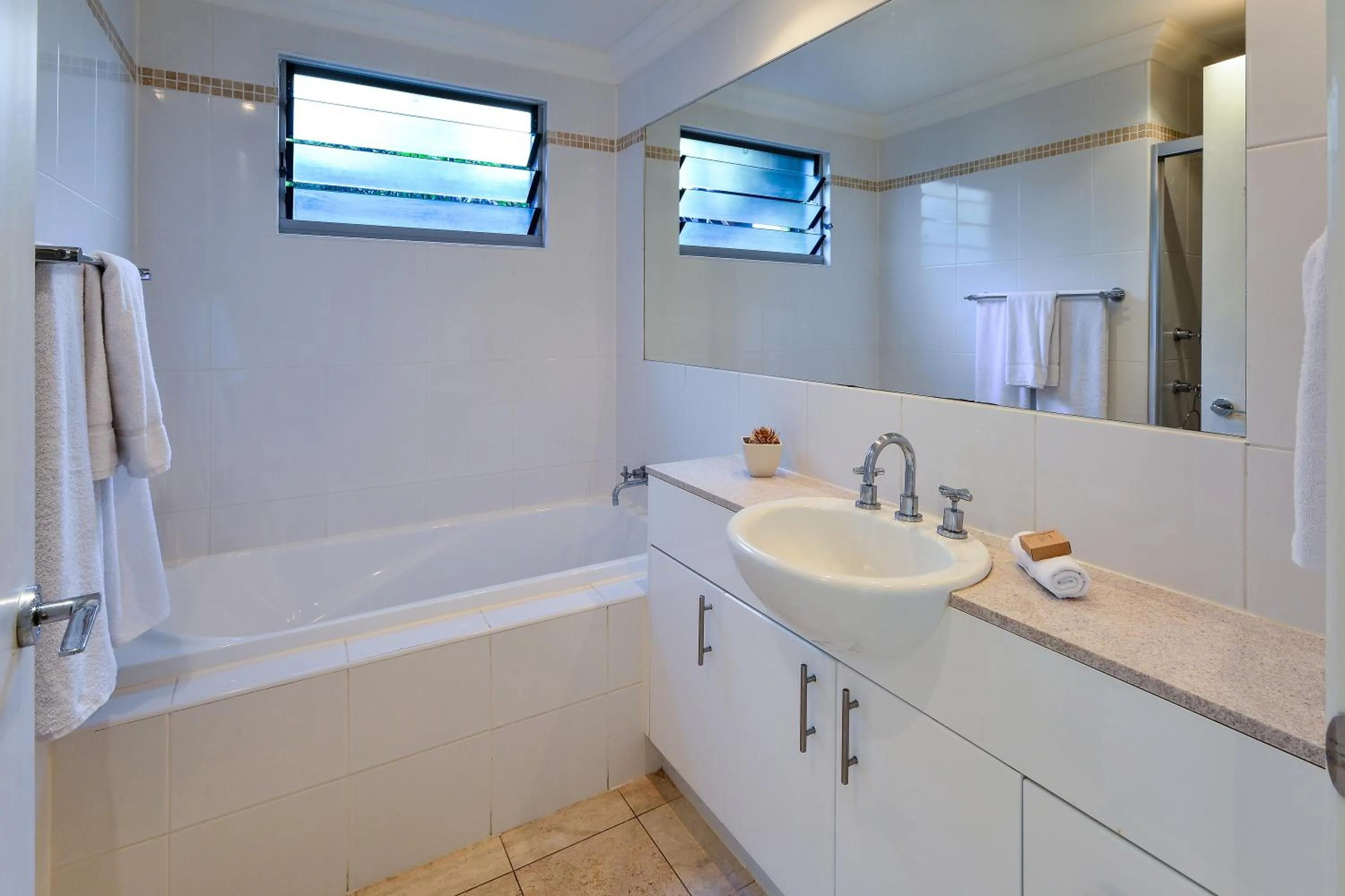 Bathroom in Blue Water Views on Hamilton Island by HIHA