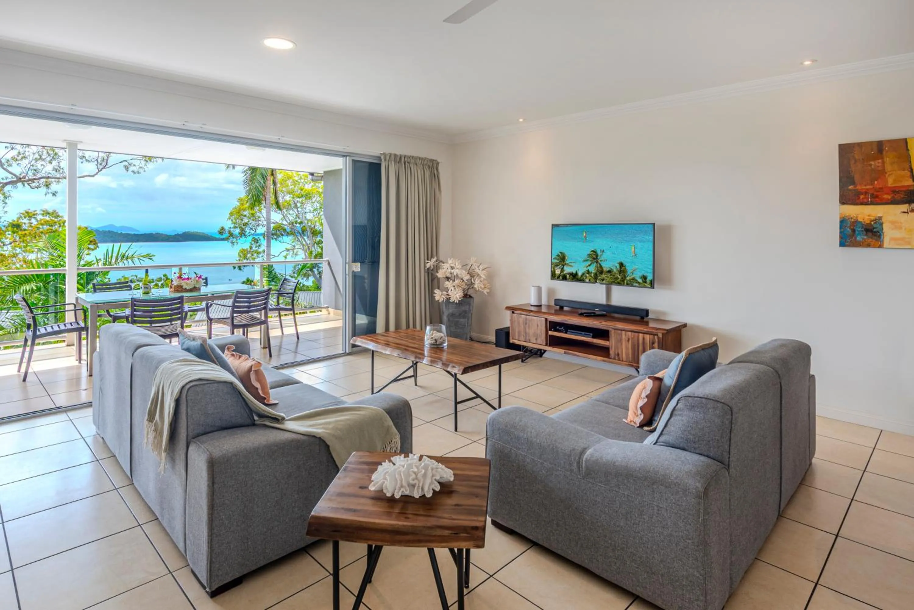Living room in Blue Water Views on Hamilton Island by HIHA