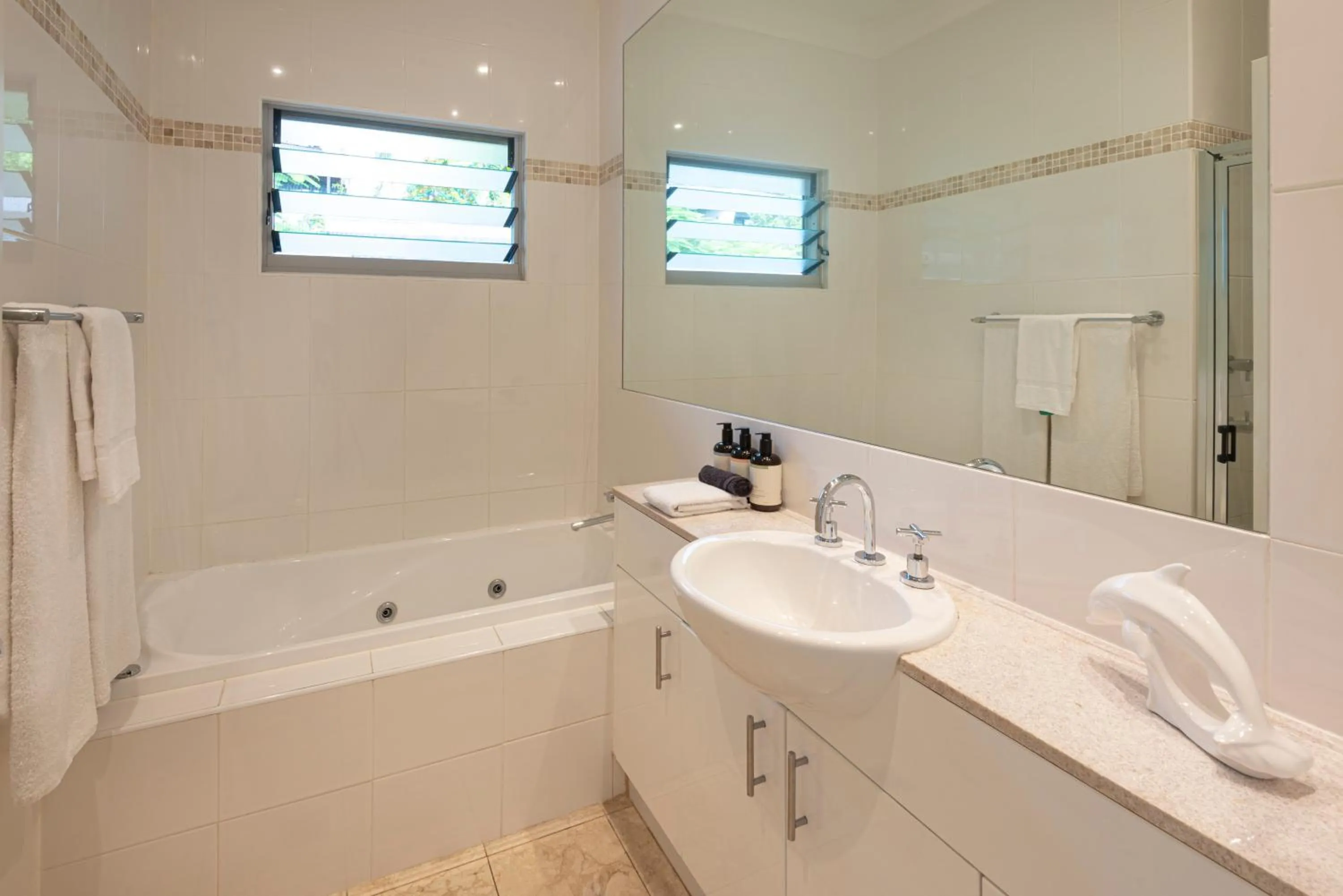 Bathroom in Blue Water Views on Hamilton Island by HIHA