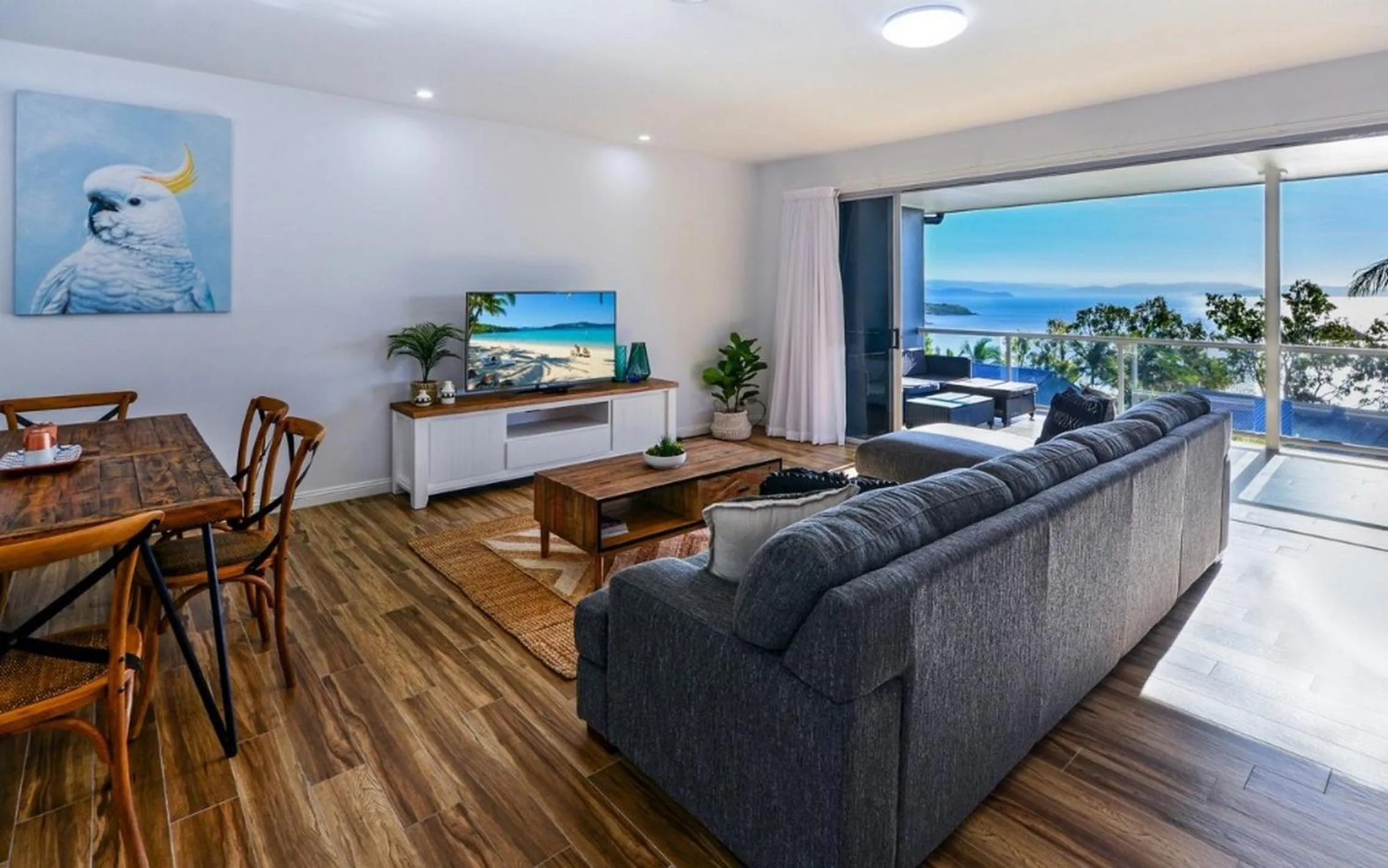 Living room in Blue Water Views on Hamilton Island by HIHA