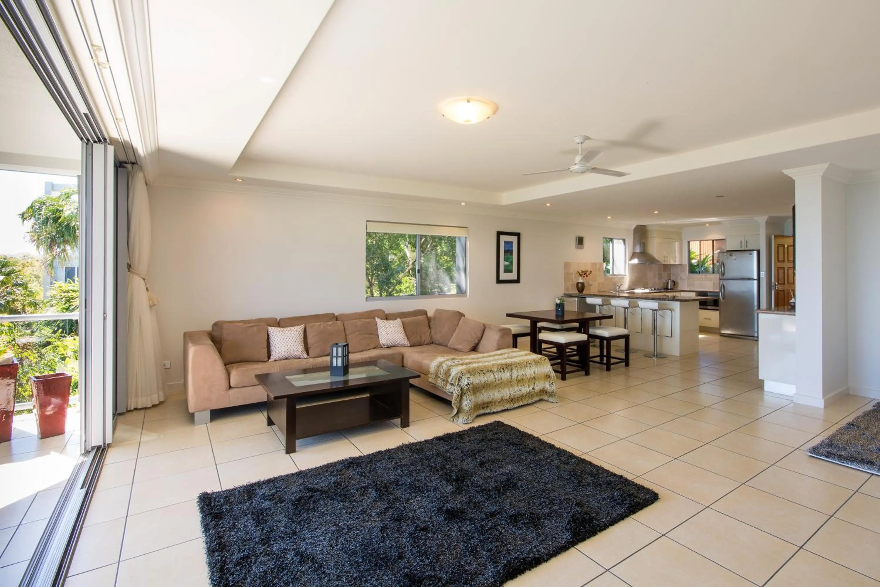 Living room in Blue Water Views on Hamilton Island by HIHA